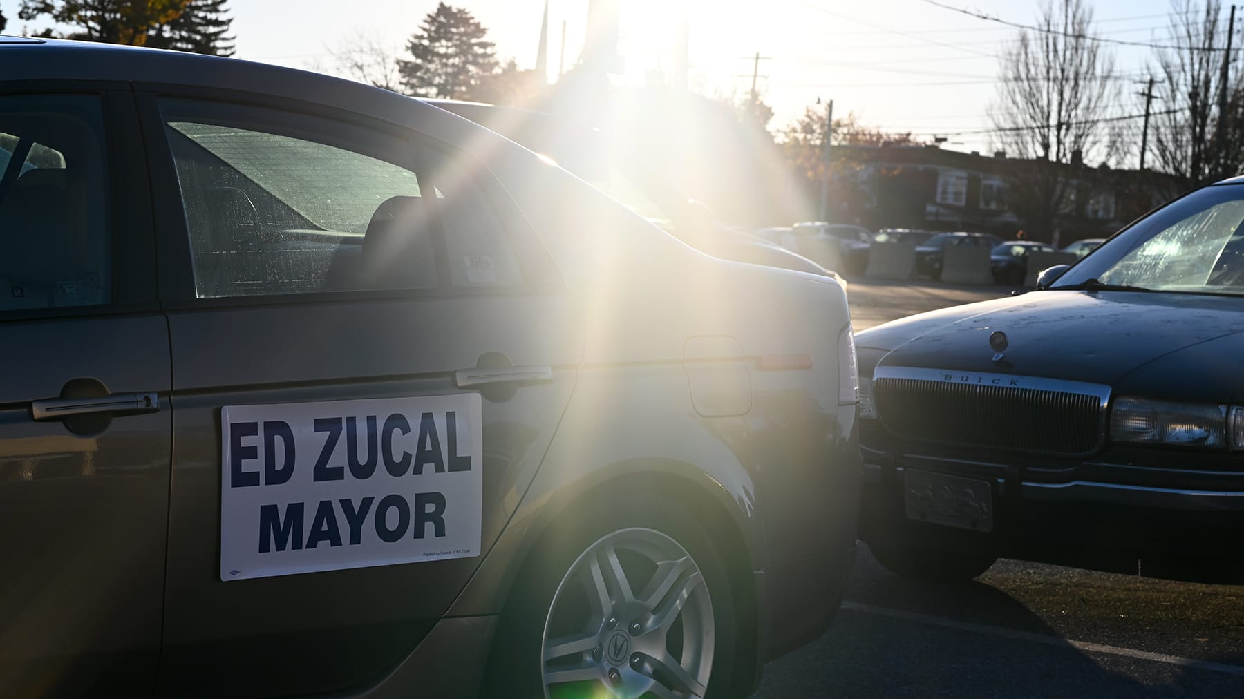 A campaign sign for Allentown mayoral candidate Ed Zucal hangs on a car outside the Agriculture Hall polling place on Tuesday