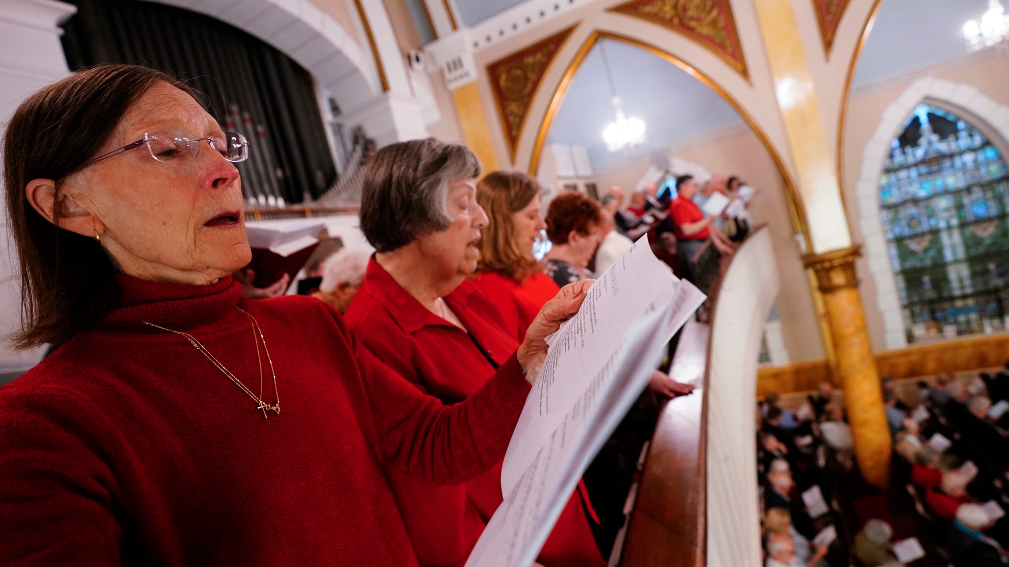Michelle Lloyd, left, and other members of the choir sing. A Thanksgiving and Leave-Taking service was held at St. John's Win