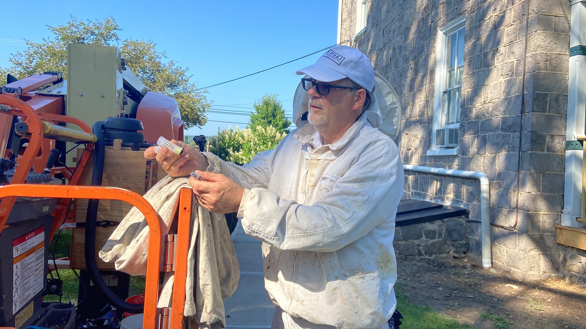 James Zdepski, a beekeeper and carpenter, removed a colony of bees Wednesday from the Riegelsville's borough hall.