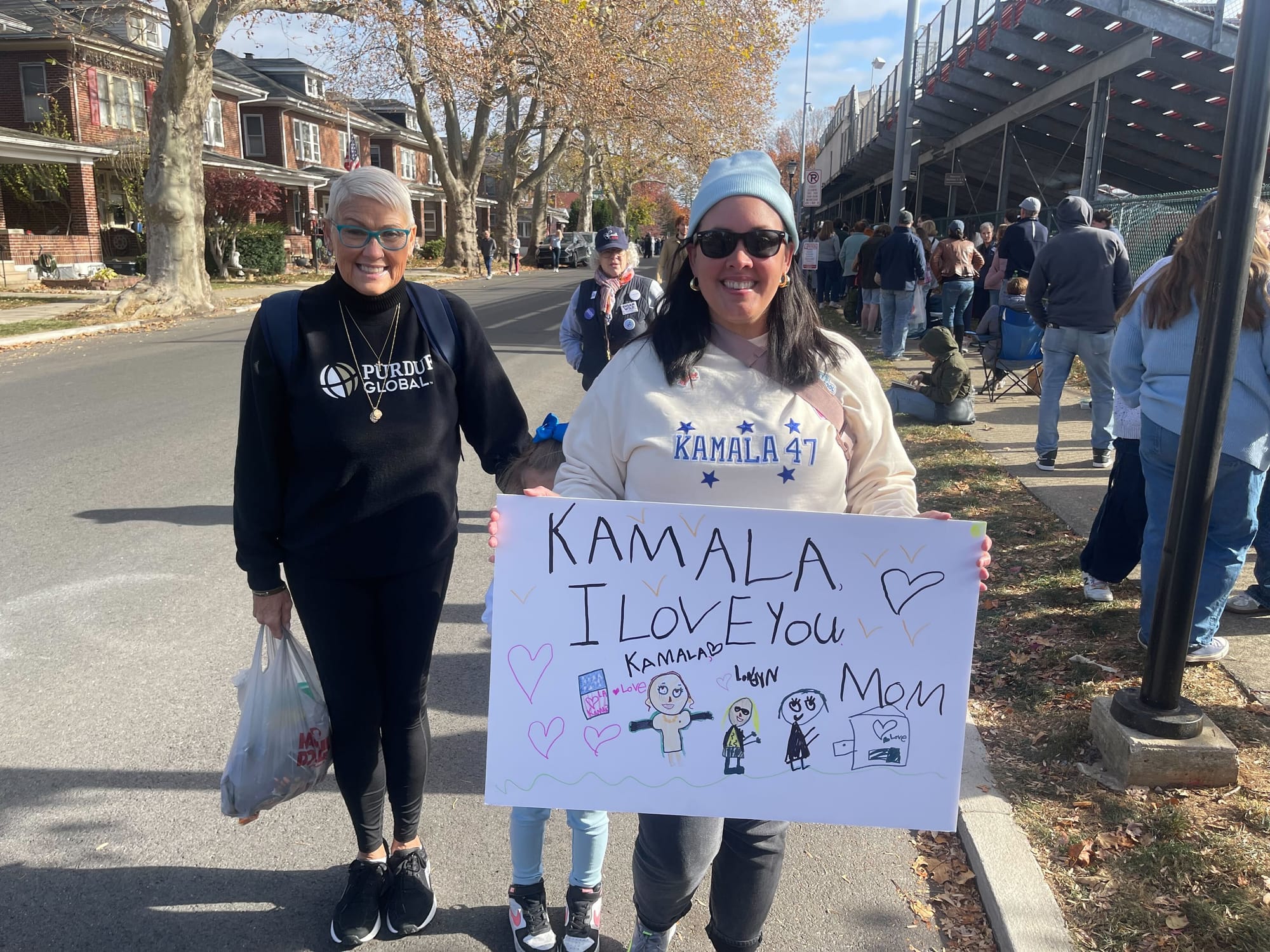 Leslie Pierson, her daughter Londyn Pierson, and Londyn's grandmother attend the Kamala Harris rally at Muhlenberg College on