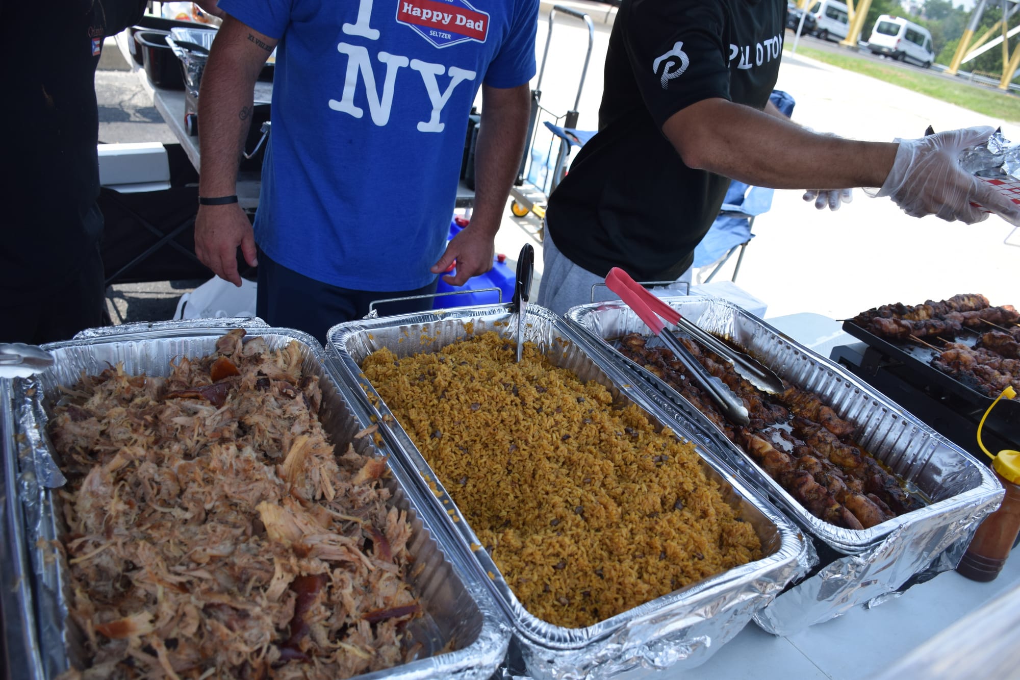 Pernil, arroz and carne were some of the Puerto Rican eats sold at the Puerto Rican parade and festival on July 28, 2024.