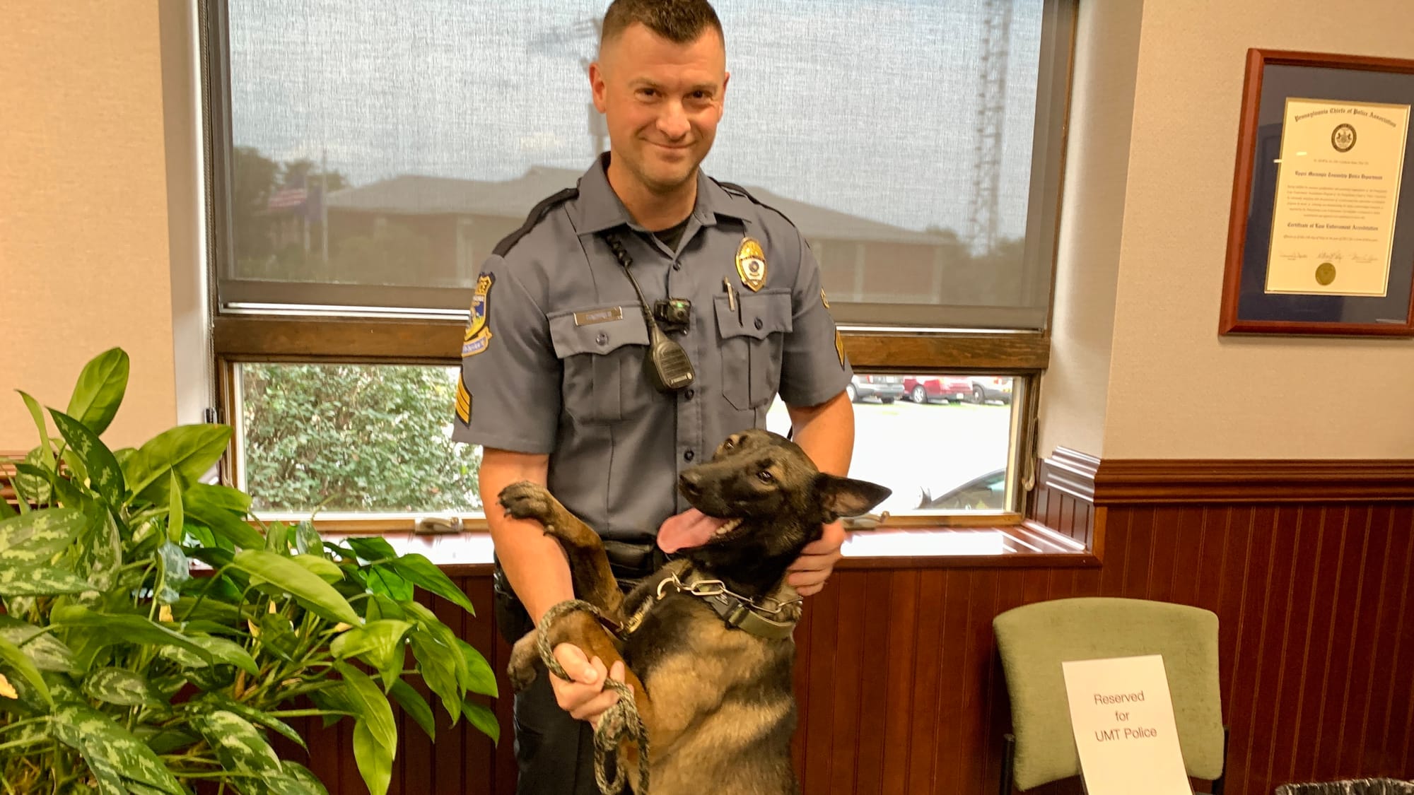 Sergeant Matthew Gardner with K-9 Nyala.