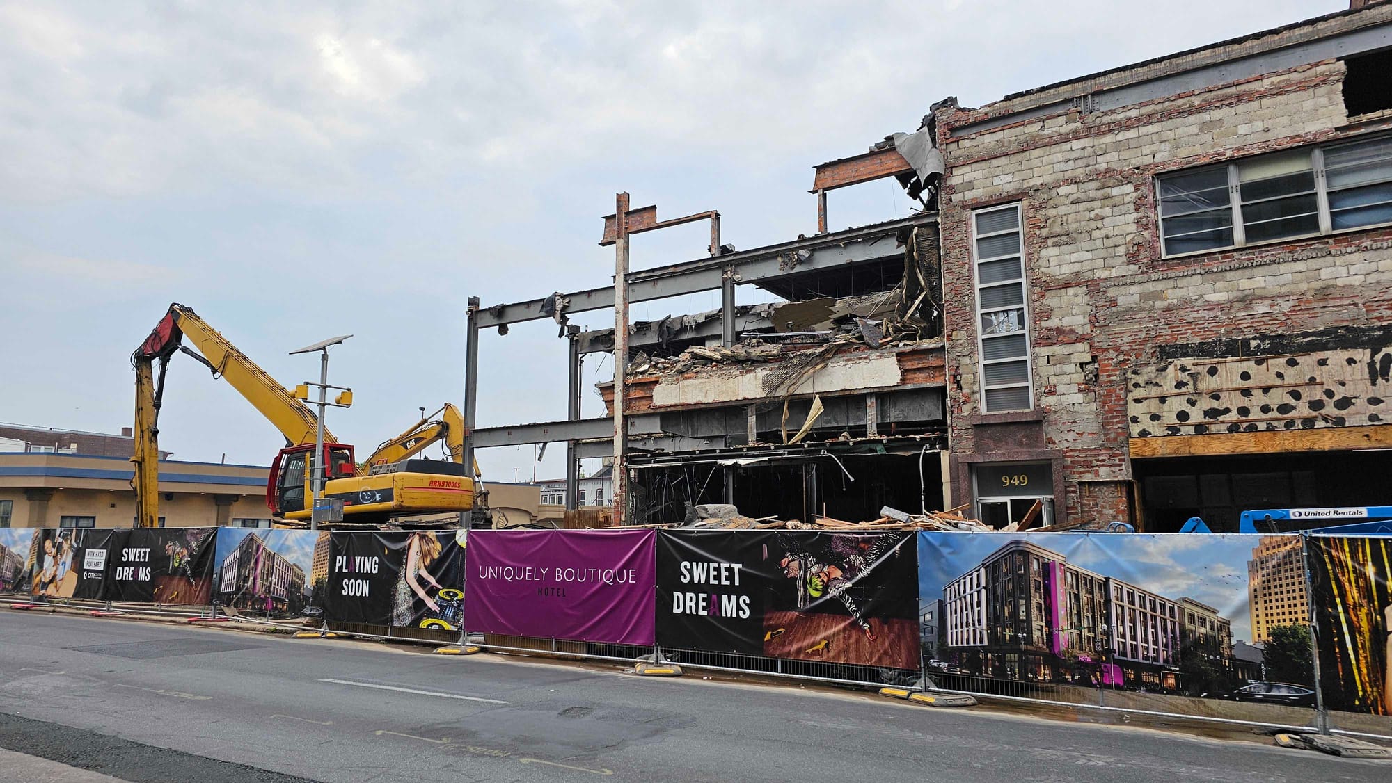 Demolition crews work June 8 to knock down a row of buildings in downtown Allentown where City Center plans to open a five-st