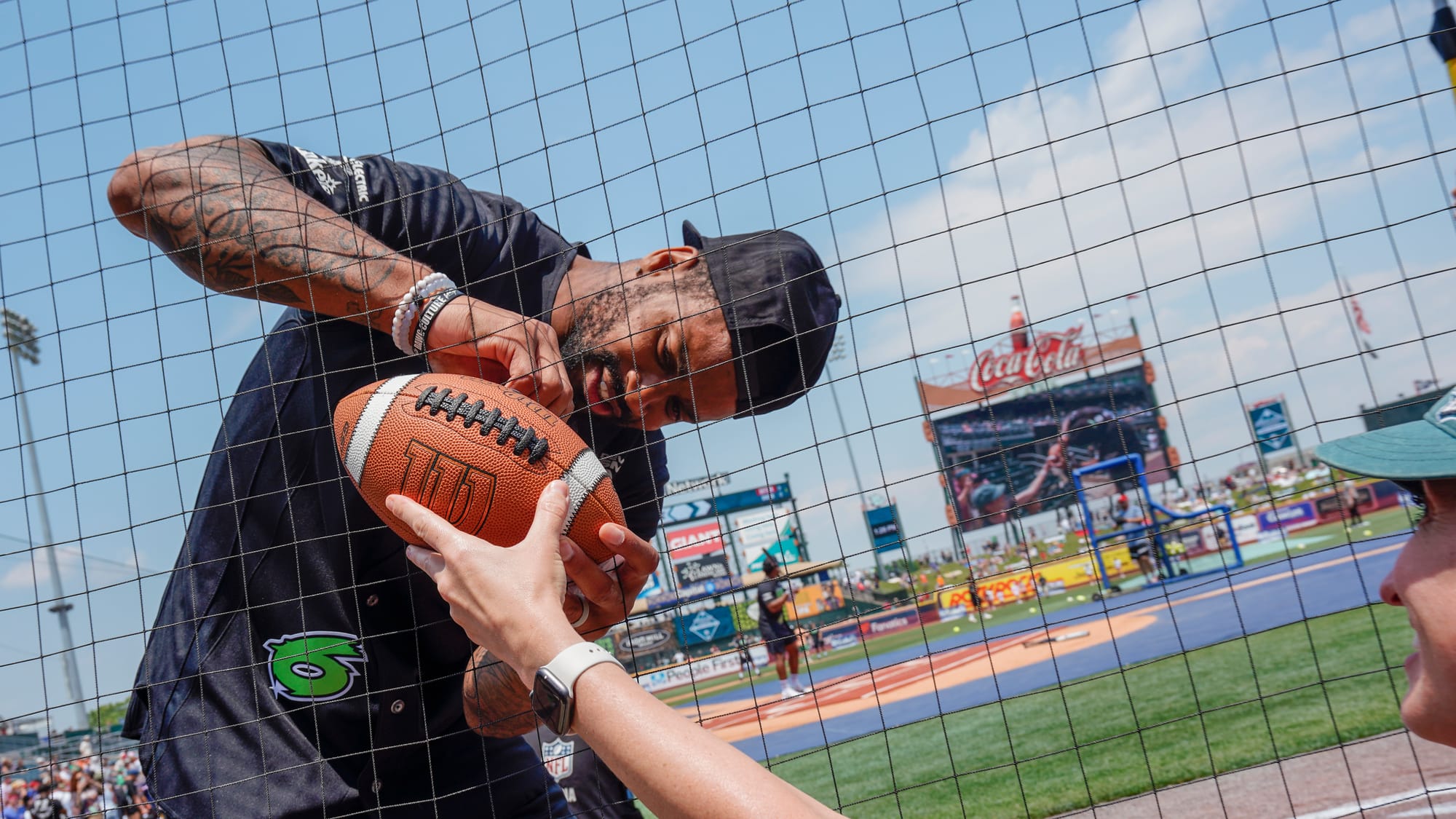 Darius Slay signs an autograph. The 2nd annual DeVonta Smith Celebrity Softball Game was held at Coca-Cola Park in Allentown 