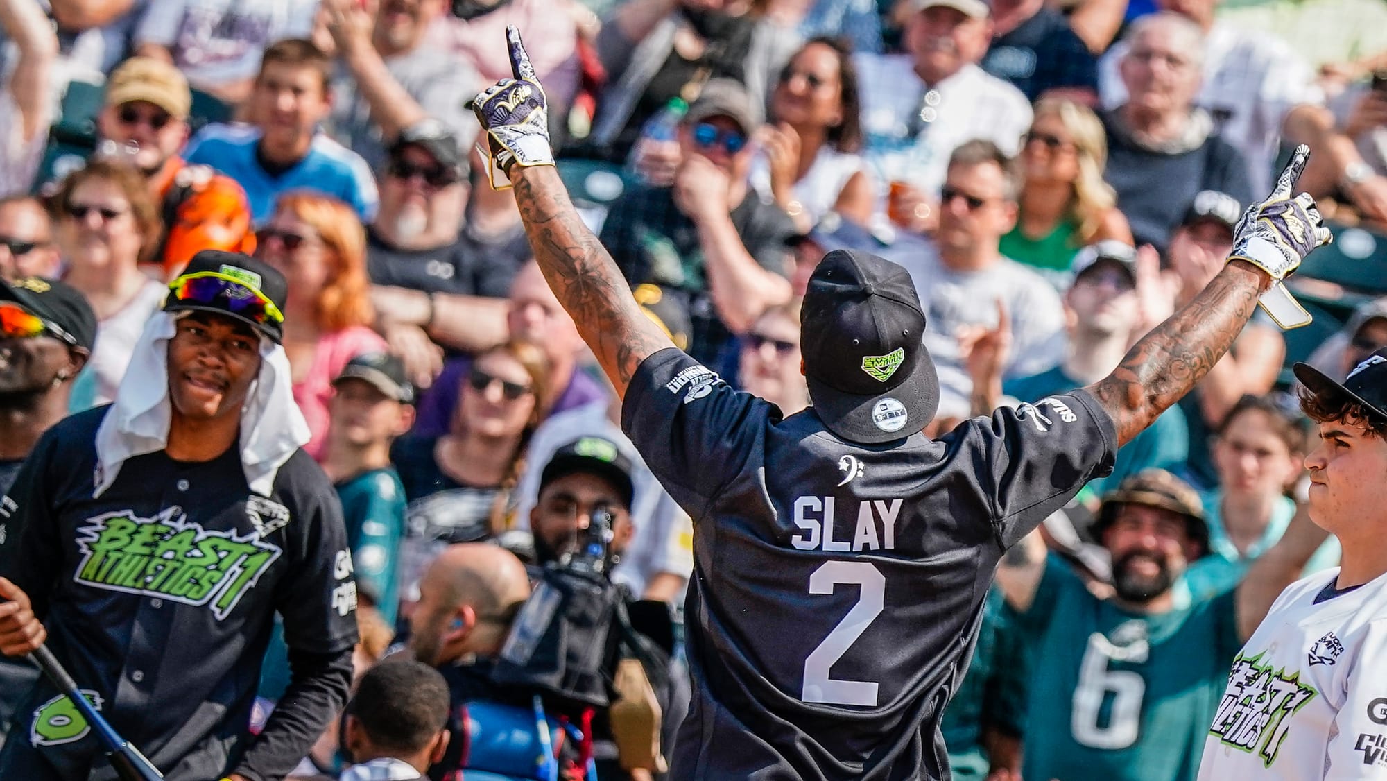 Darius Slay of the Eagles greets the crowd. The 2nd annual DeVonta Smith Celebrity Softball Game was held at Coca-Cola Park i