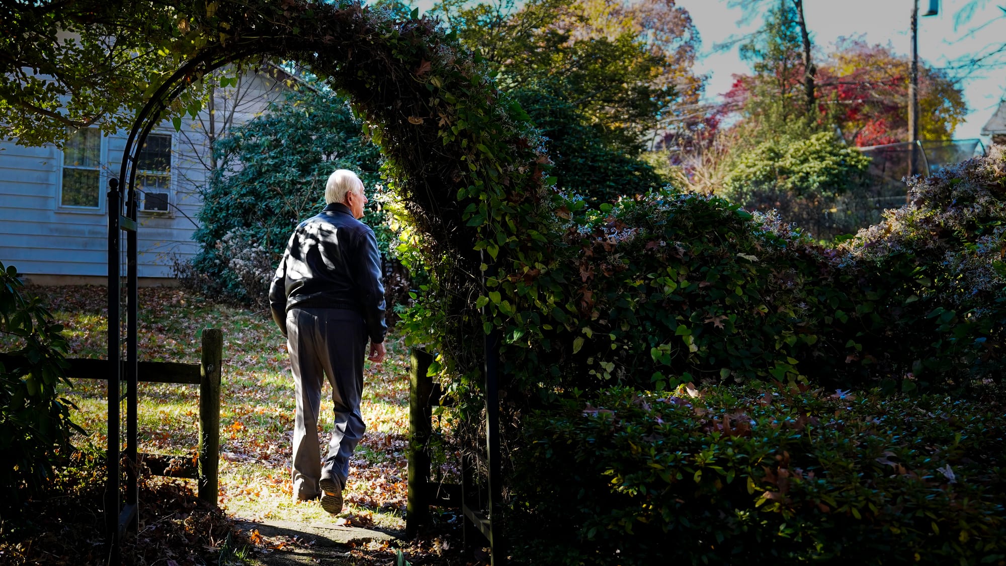 Fred Buse walks in his backyard. Fred Buse, 87, of South Whitehall Township, has been tracking climate change in his Allentow