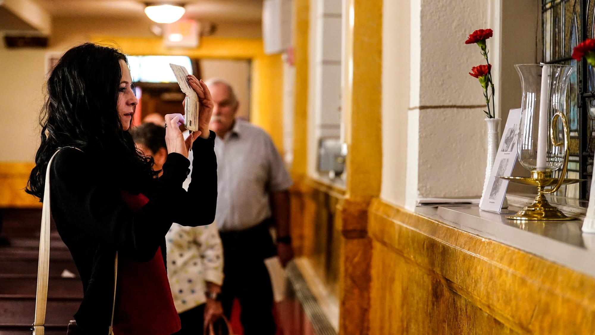 Dr. Klaudia Sedar, Archivist of the Evangelical Lutheran Church in Slovenia, records moments of Sunday's service. A Thanksgiv