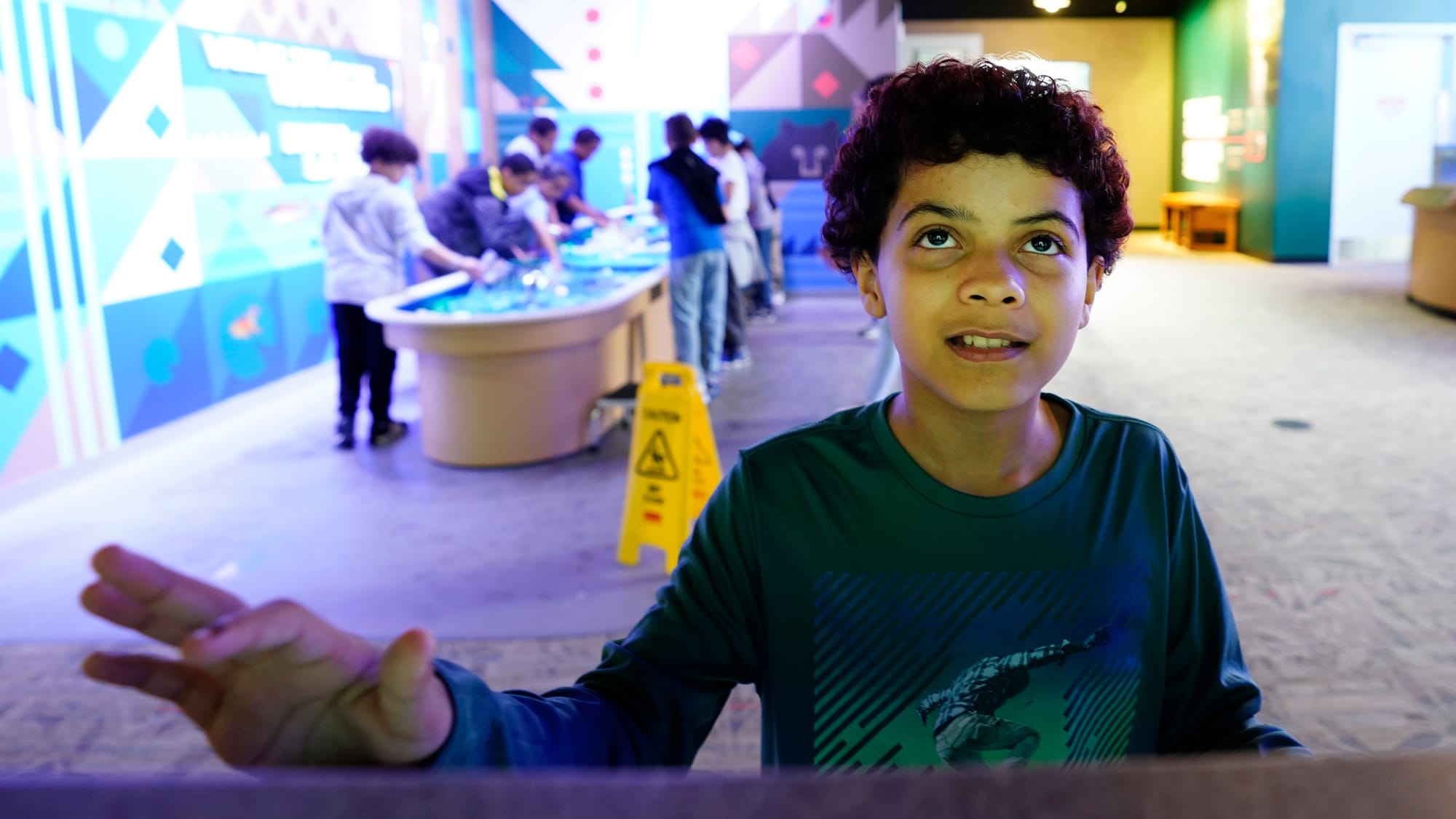 Lesavier Colon, 11, of Allentown works a geographical display. The Da Vinci Science Center at 815 Hamilton Street, Allentown,