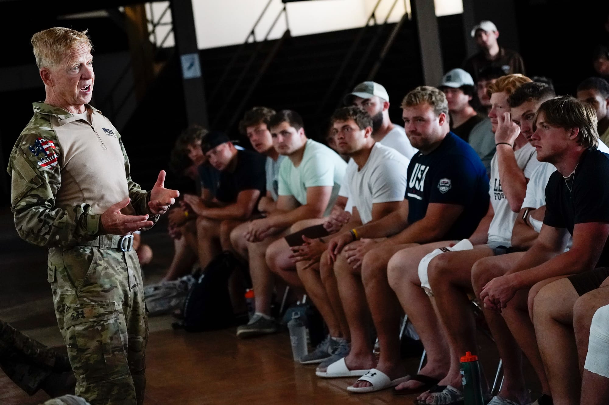 Dan O'Toole speaks to Lehigh football players. U.S. Special Forces members including U.S. Navy SEALs skydive from 4,000' onto