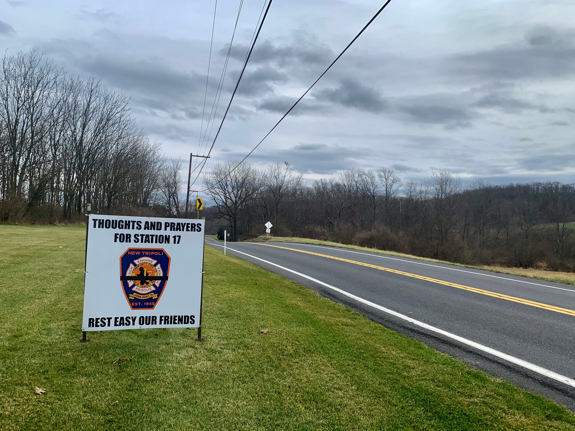 A sign along 309 sending thoughts and prayers to the fire station.
