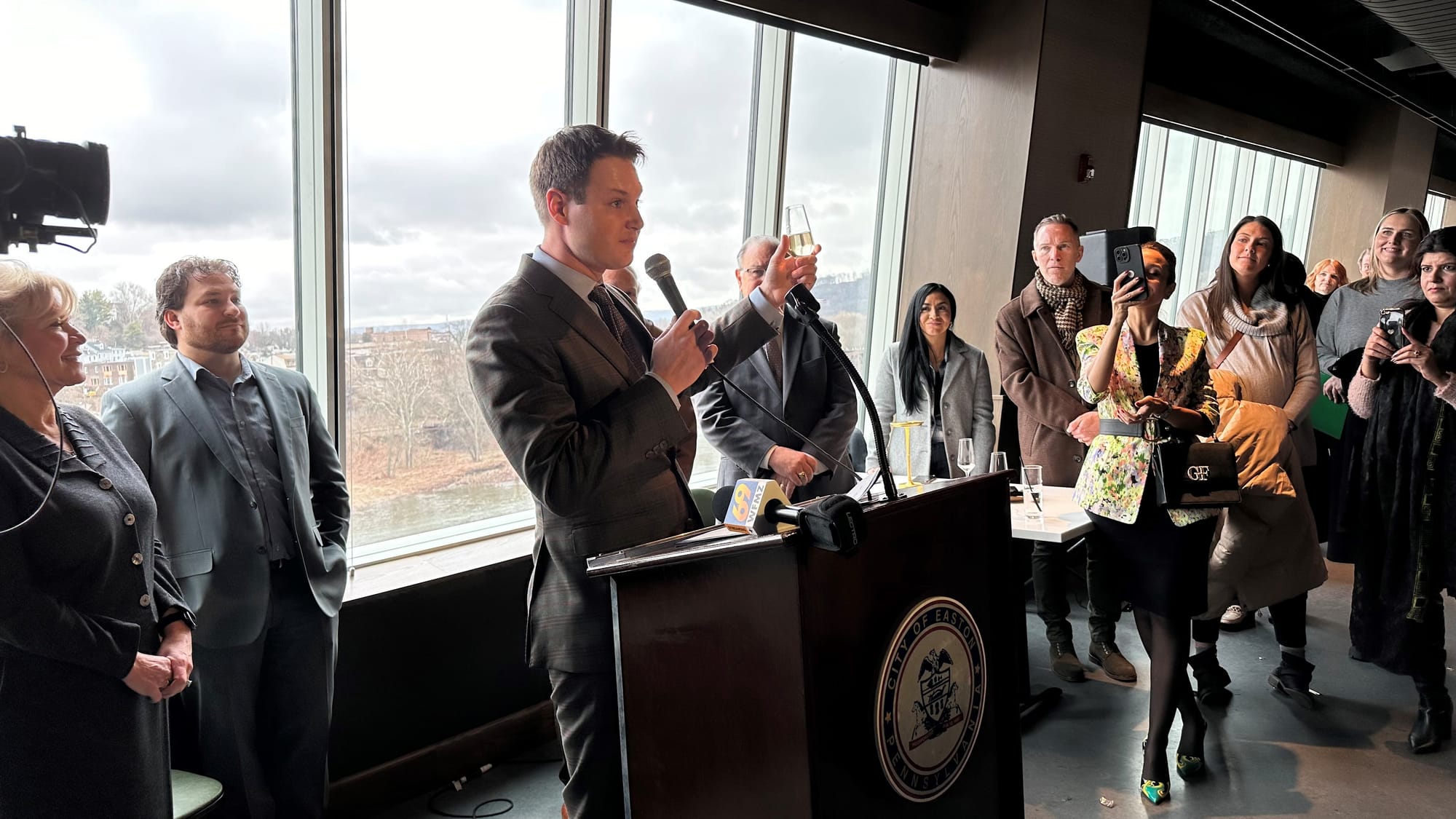 Optima Durant Group Founding President Garett Vassel toasts to the opening of The Commodore.