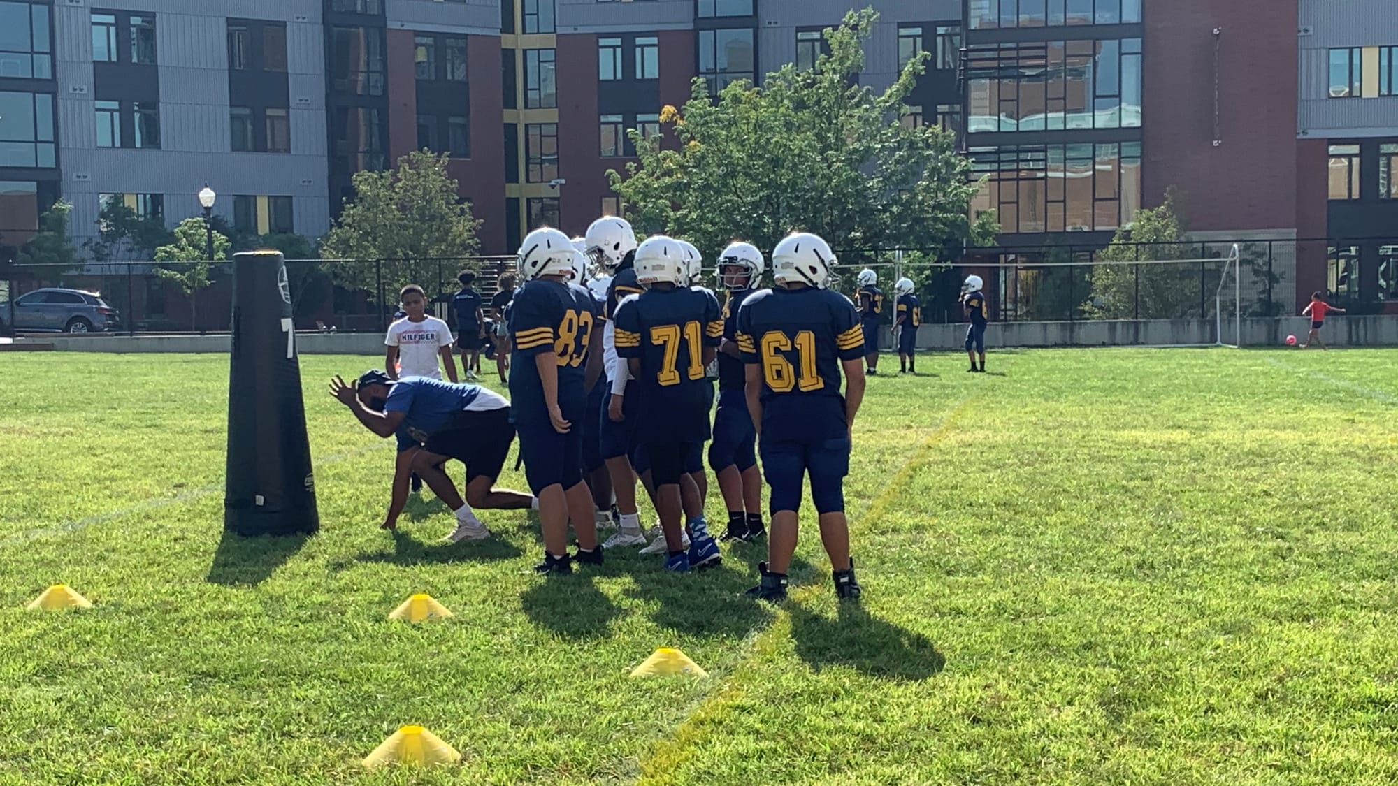 Football team members getting training during practice