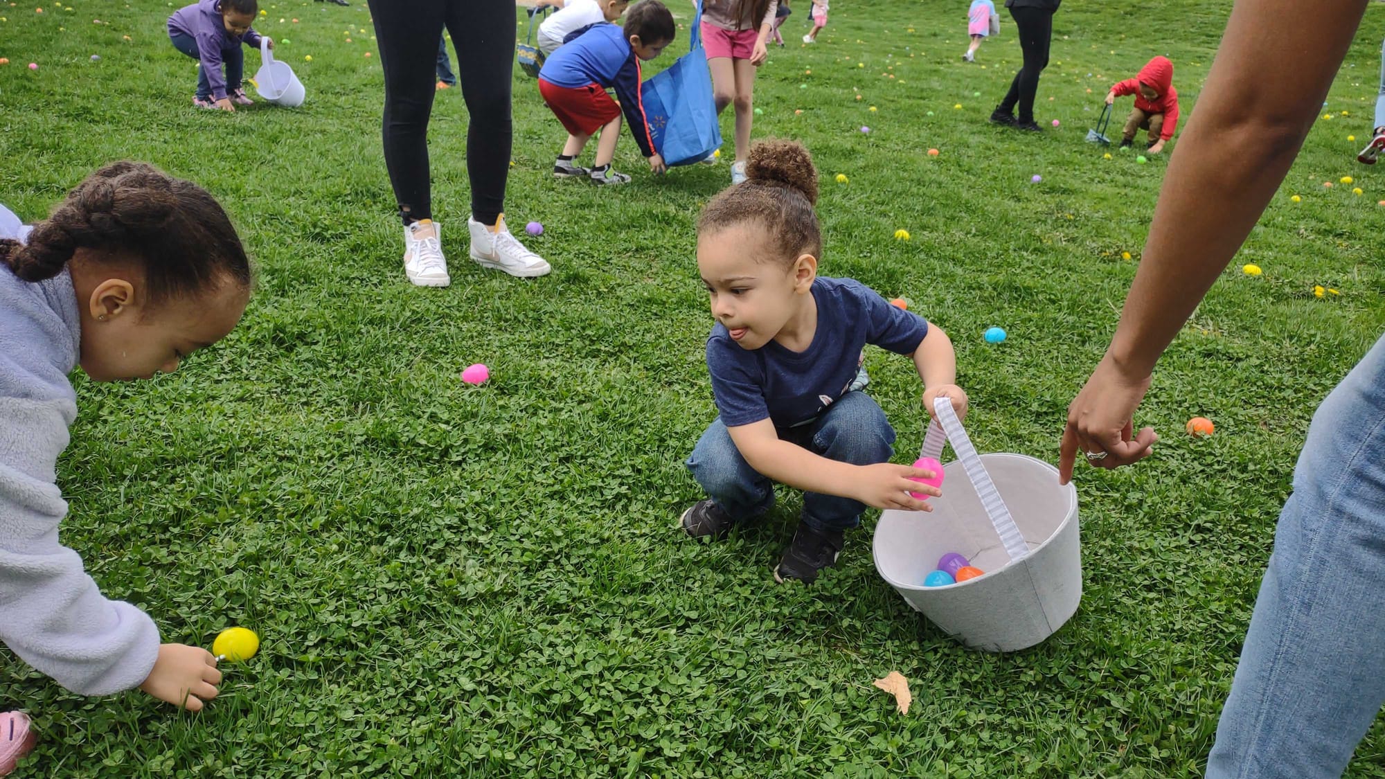 Marcel Rivera, 2, concentrates on the eggs around him during the Mayor's Egg Hunt at Jordan Park on Saturday, April 15, 2023.