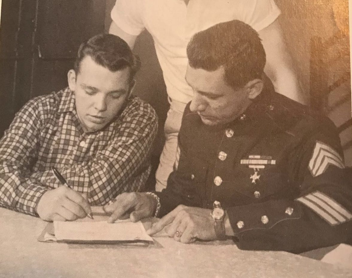 Ron Wescoe signs on with the Marines. His daughter, Jennifer, later founded the Wescoe Foundation for Pulminary Fibrosis in h