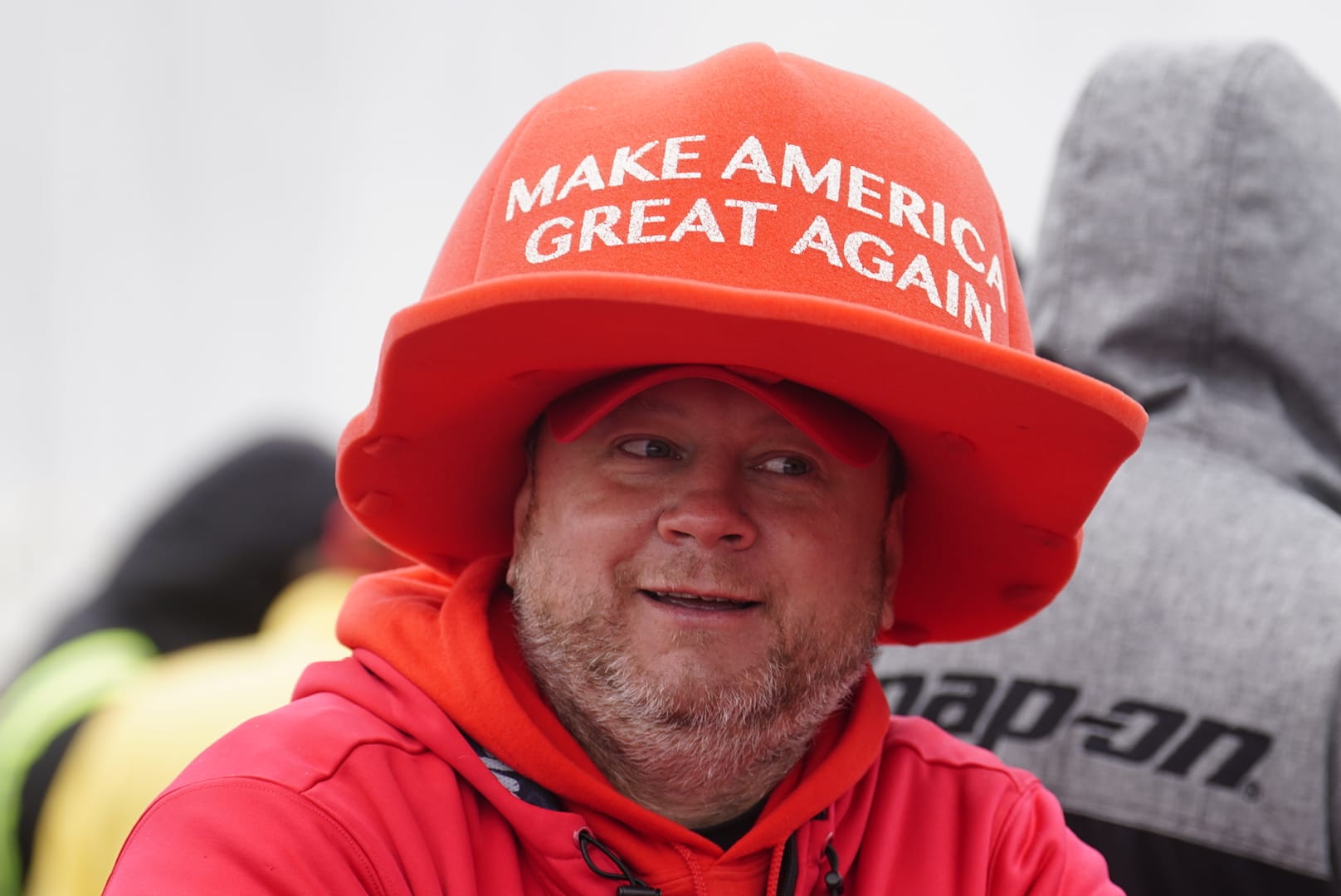 People gather ahead of Donald Trump's rally in Schnecksville, Pa. on Saturday, April 13, 2024.