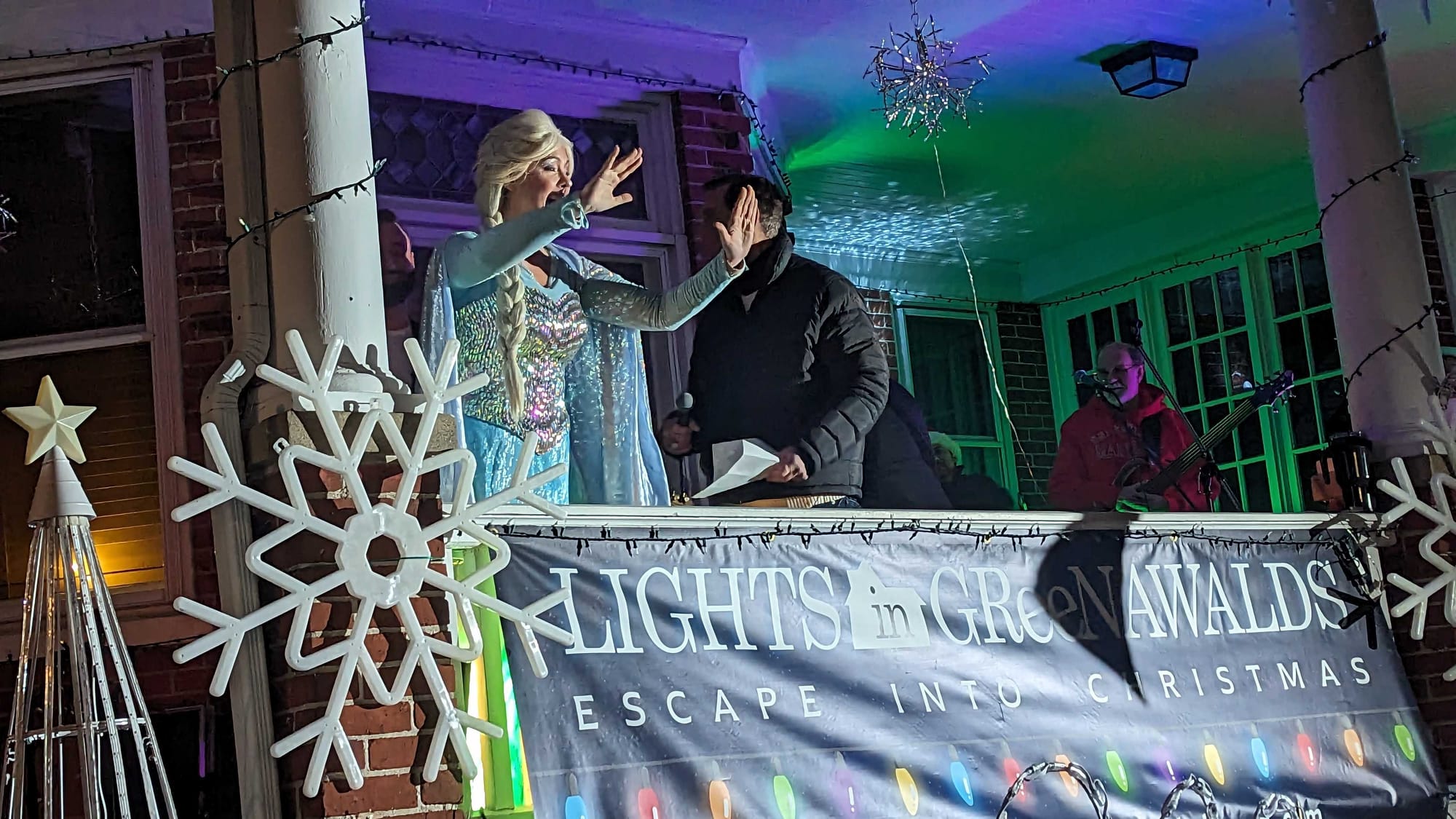 Princess Elsa from Disney's "Frozen" is introduced to the crowd at the Opening Night of the Lights in Greenawalds.
