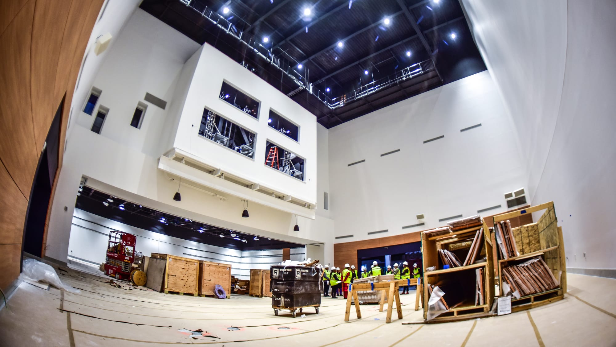 Visitors learn about Curiosity Hall and the Science Theater. Representatives of the Da Vinci Science Center lead members of t