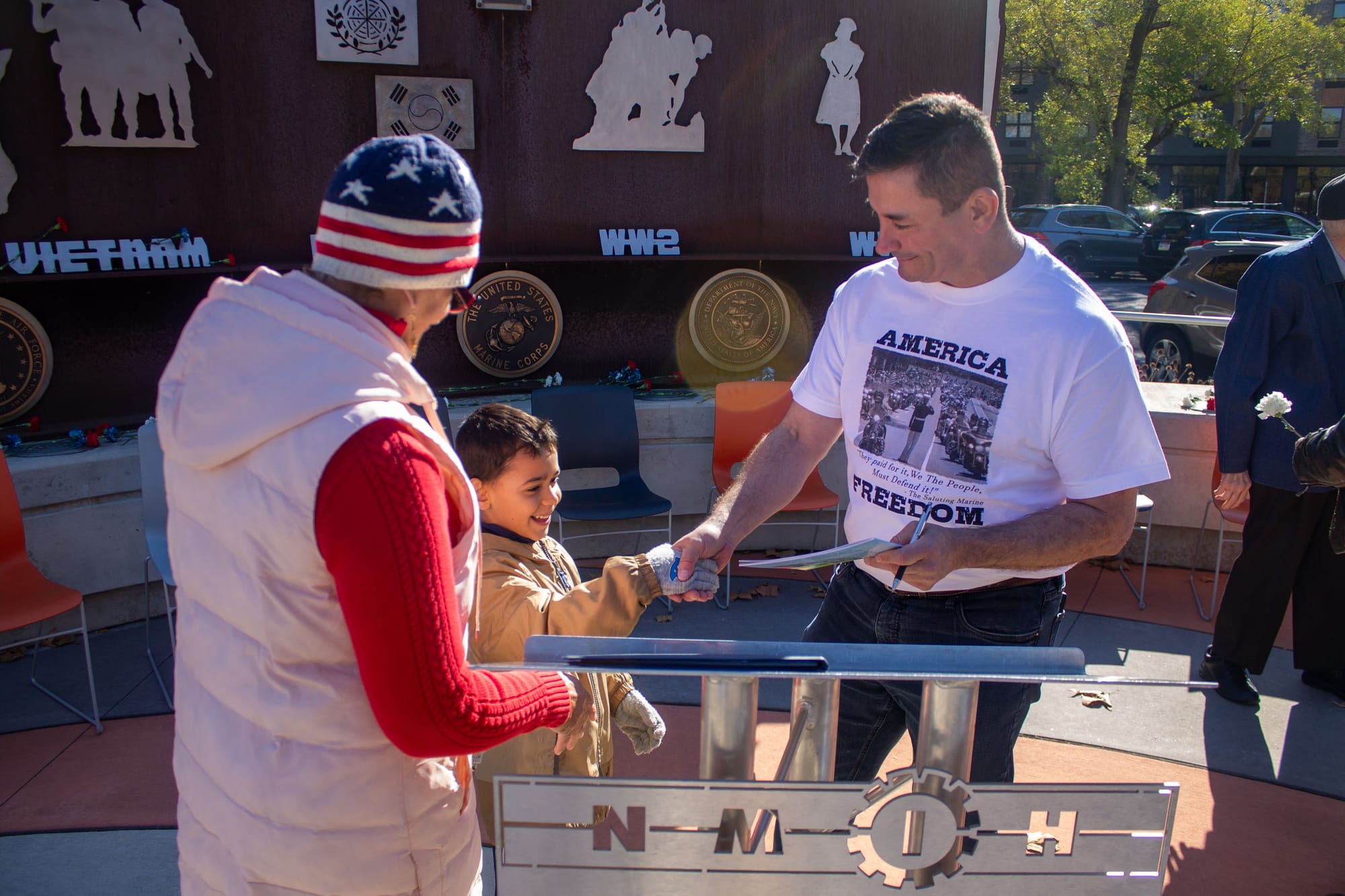 Saluting Marine and Amir, who wants to be a Marine when he grows up.