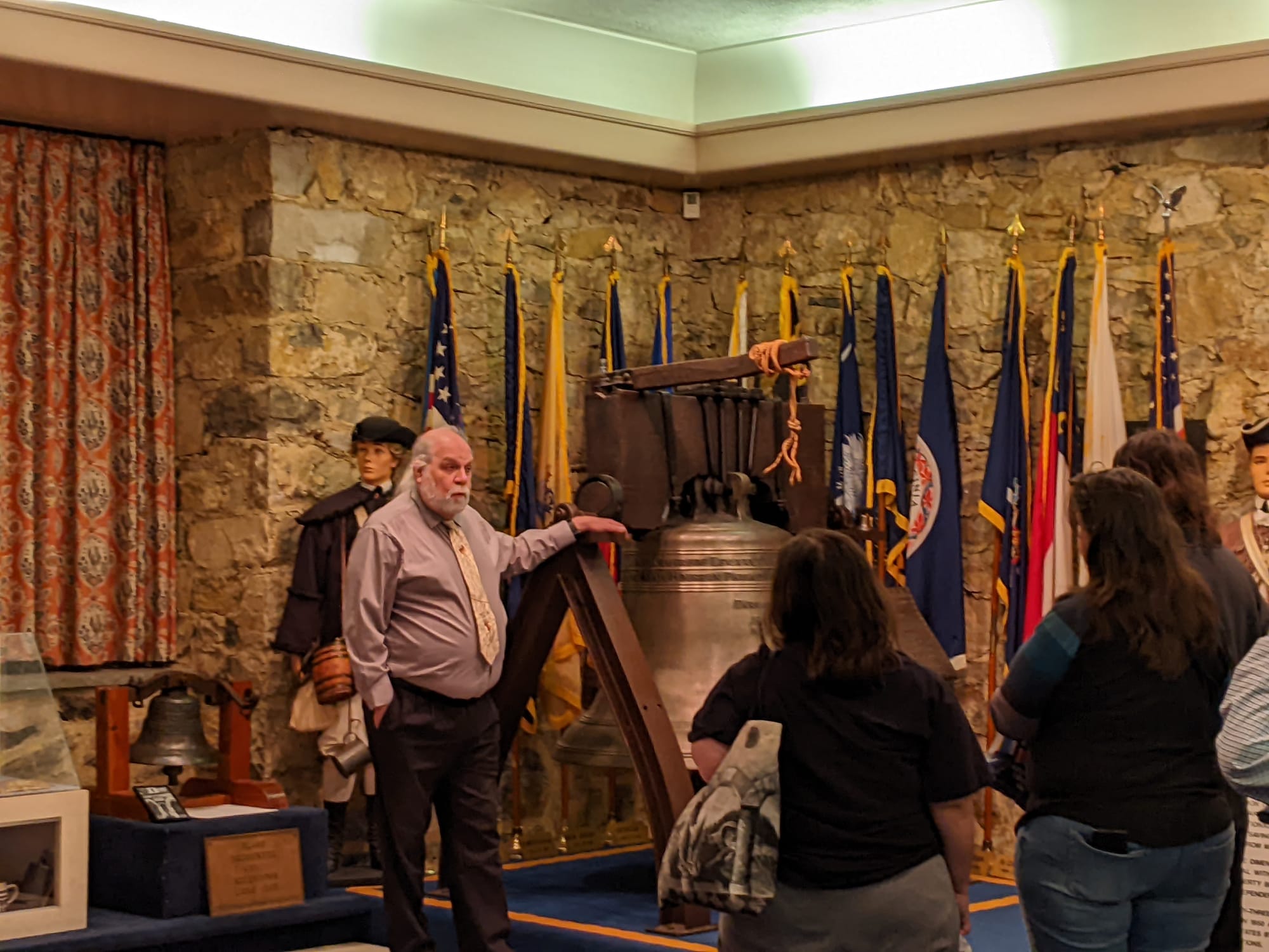 Liberty Bell Museum guide Jim Mindock leads the second-to-last tour at the museum Saturday, April 1.