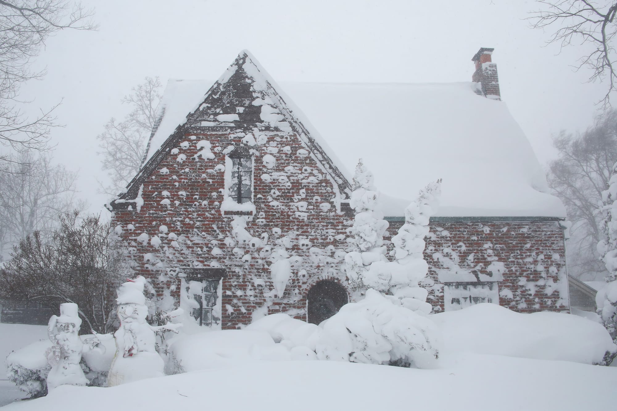 A winter storm rolls through Western New York Saturday, Dec. 24, 2022, in Amherst N.Y. A battering winter storm has knocked o