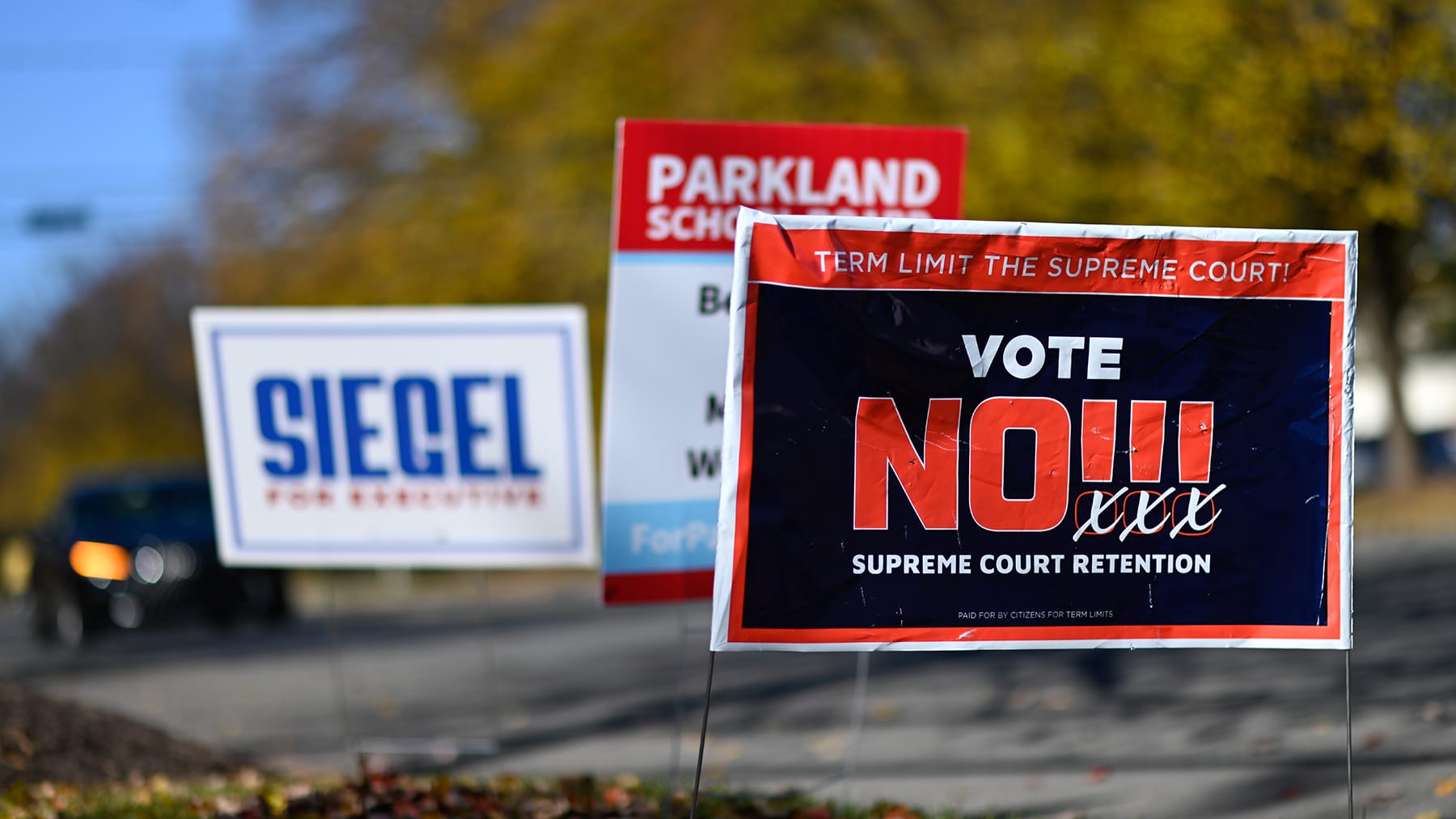 Campaign signs line the entrance to the Calvary Temple polling place on Tuesday, Nov. 4, 2025 in South Whitehall, Pa.