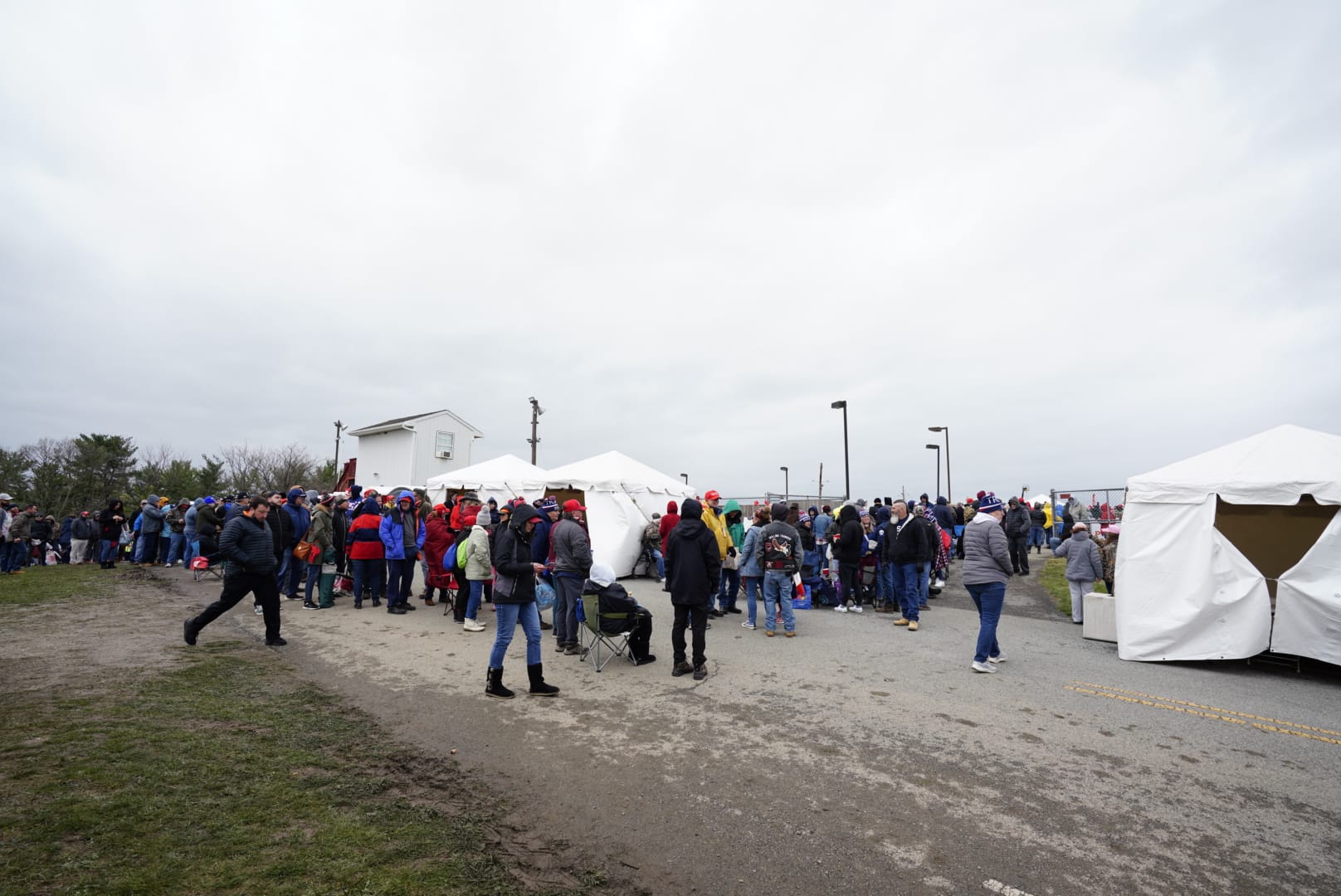 People gather ahead of Donald Trump's rally in Schnecksville, Pa. on Saturday, April 13, 2024.