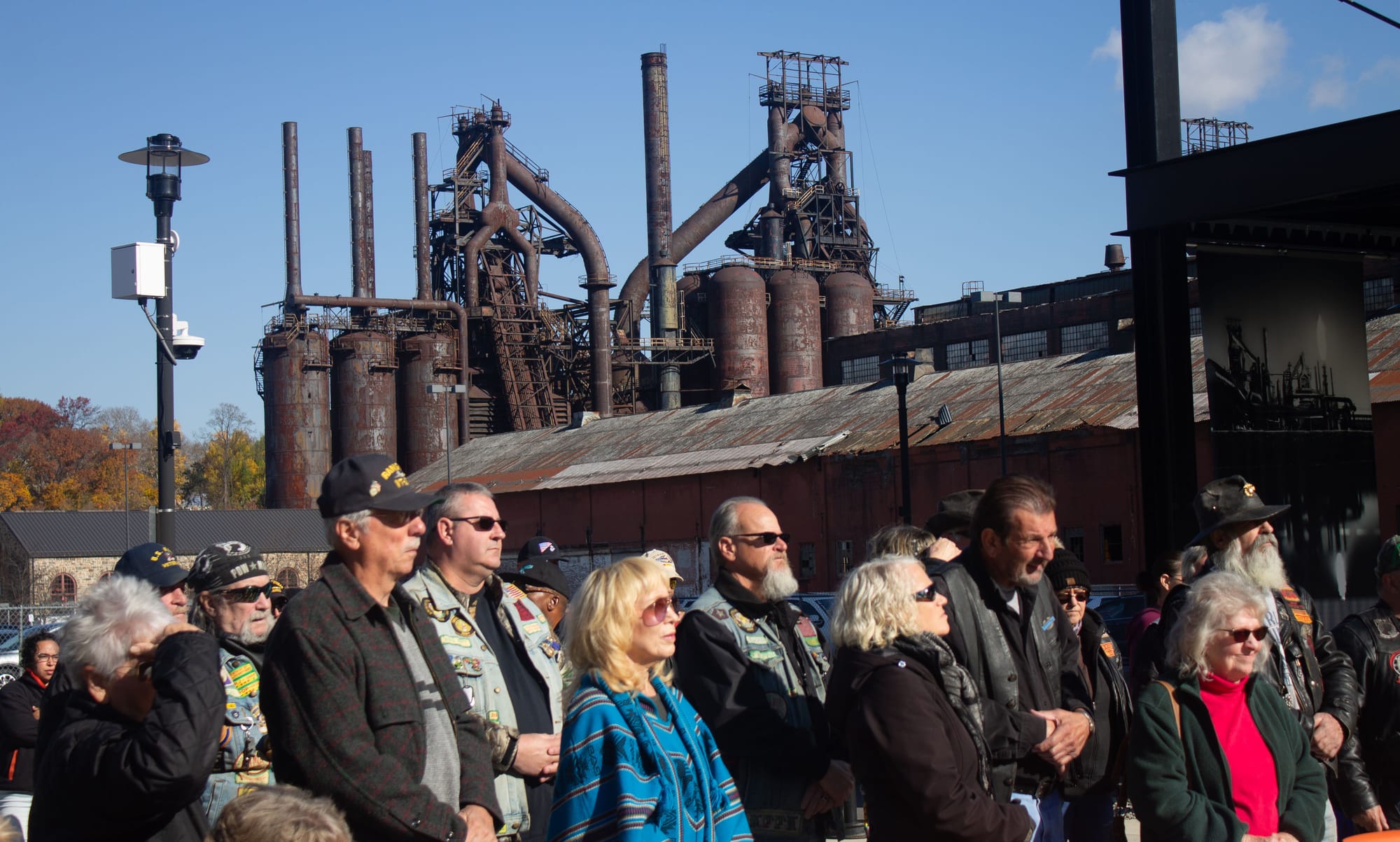 Guests stand outside the National Museum of Industrial History for the Veteran's Day ceremony.