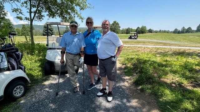 Stephen Kave, Kimberly Bartman, and Mike Frey at a fundraiser for the Lehigh Valley Amputee Support Group.