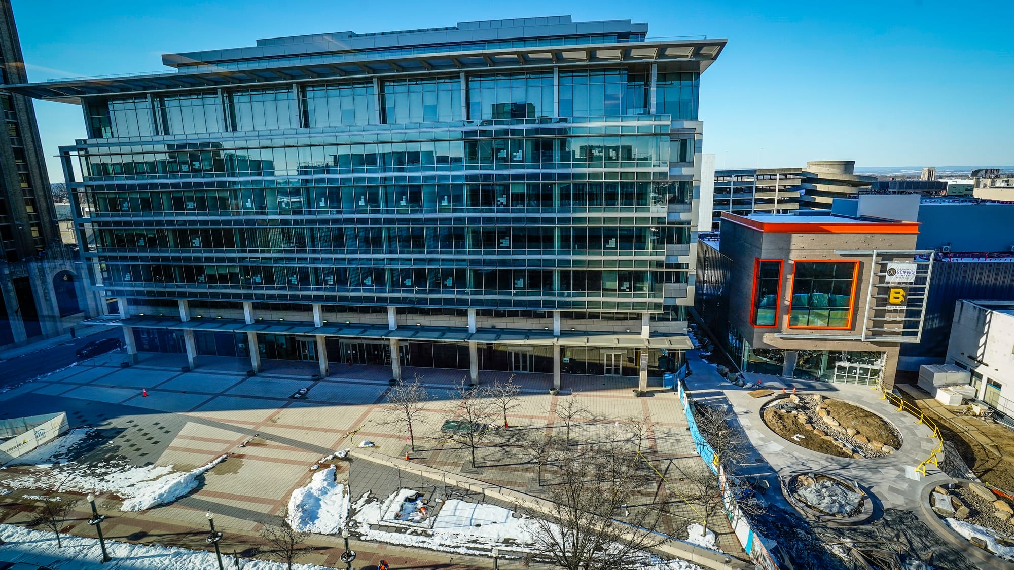 The new Da Vinci Science Center is at right with the orange trim. Representatives of the Da Vinci Science Center lead members