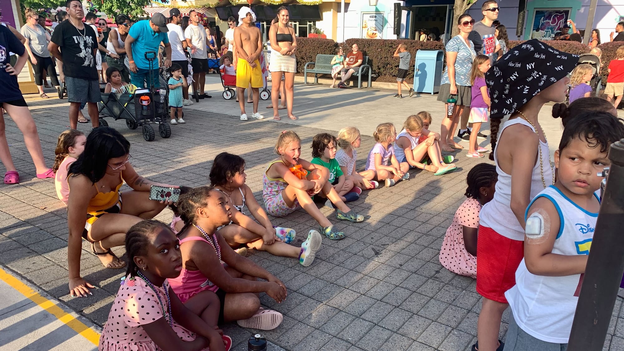 Children watch a performance at Dorney Park's Grand Carnivale.