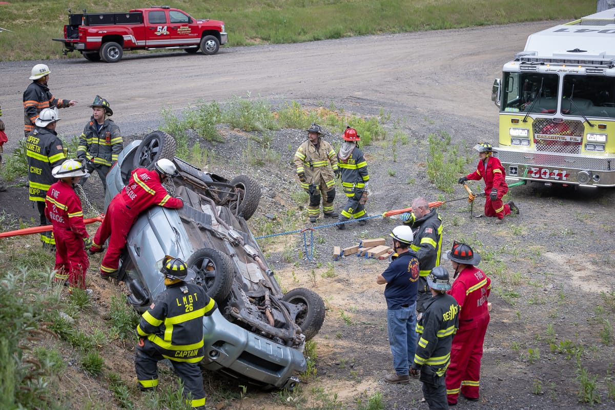 Firefighters work on vehicle rescue during a training event in Palmer Township on May 25, 2023.