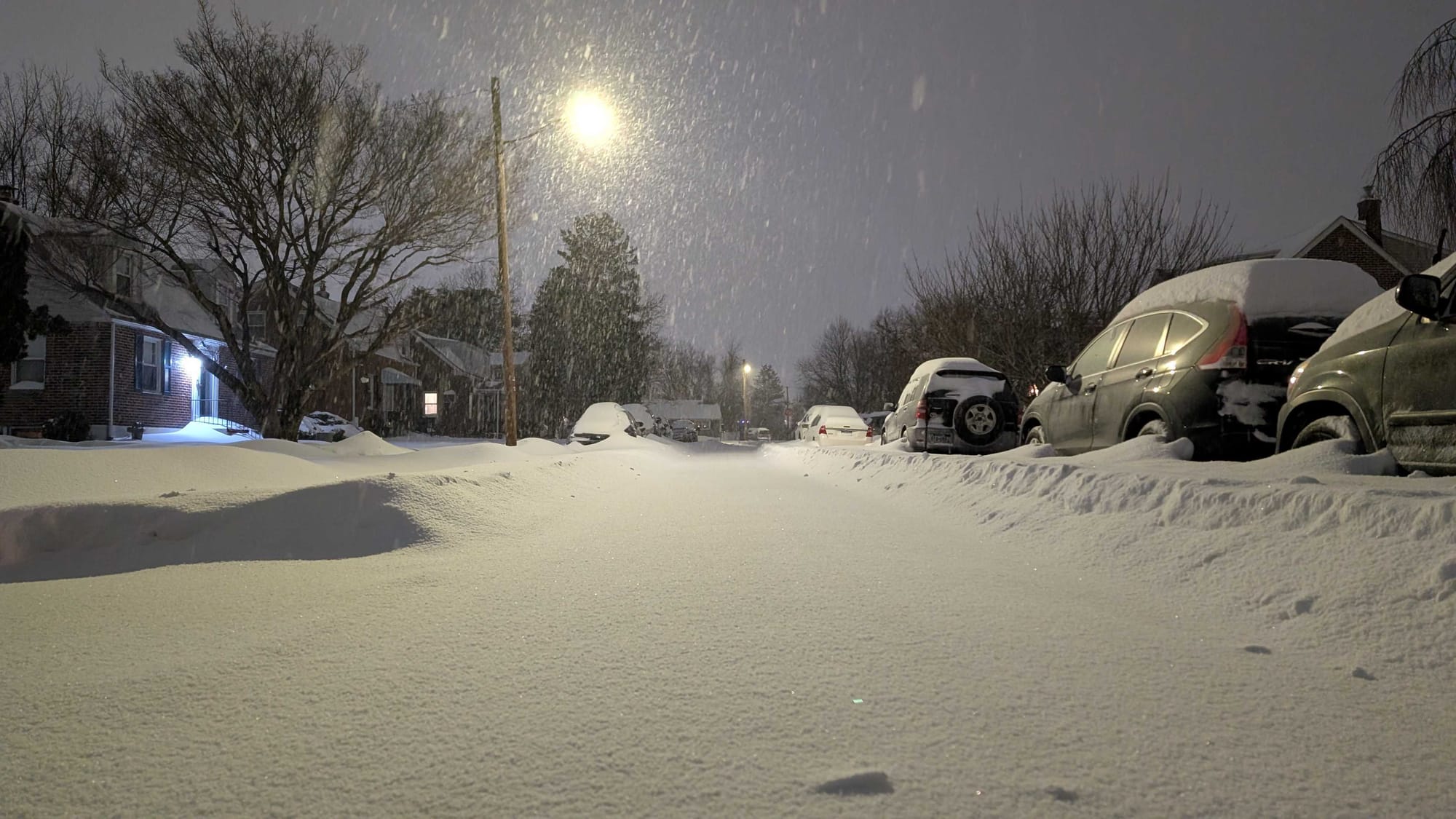 A mix of sleet and snow falls in Allentown on Sunday night.