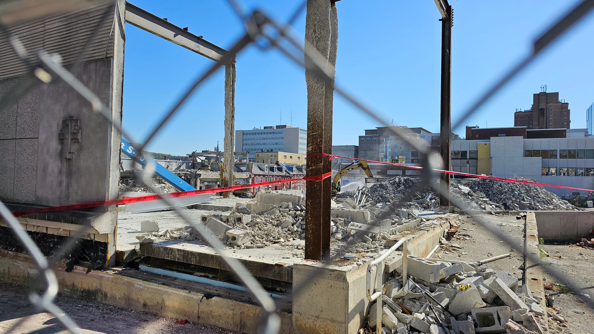 The demolition site at The Morning Call's former building is seen Tuesday, Oct. 24, through a fence around the property.