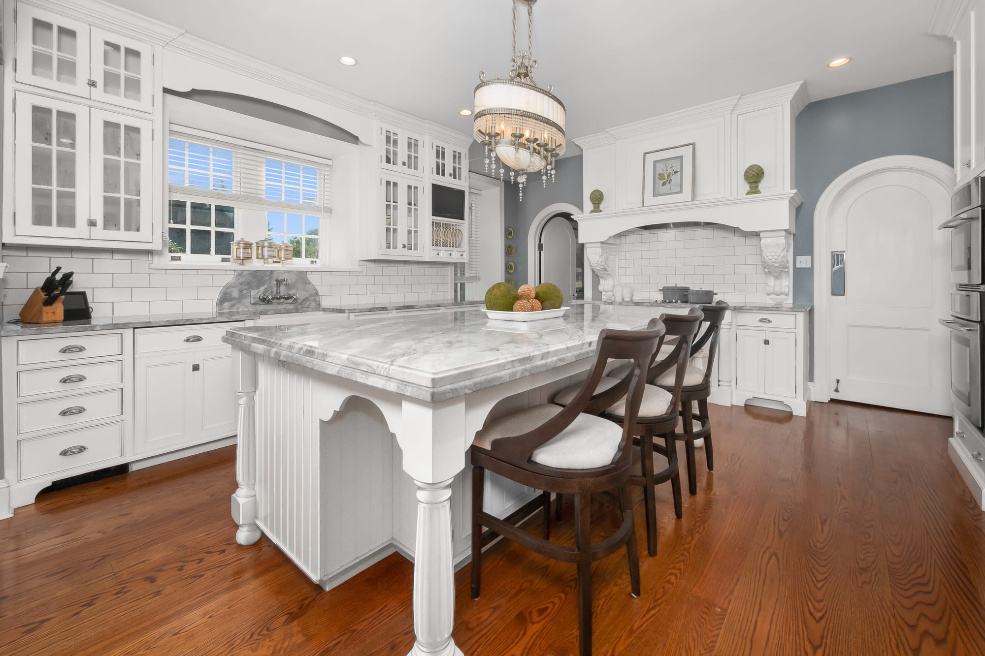 The 3-story Federal-Style Georgian Colonial mansion at 1880 W Union Boulevard sits on 1.27 acres and boasts a grand staircase