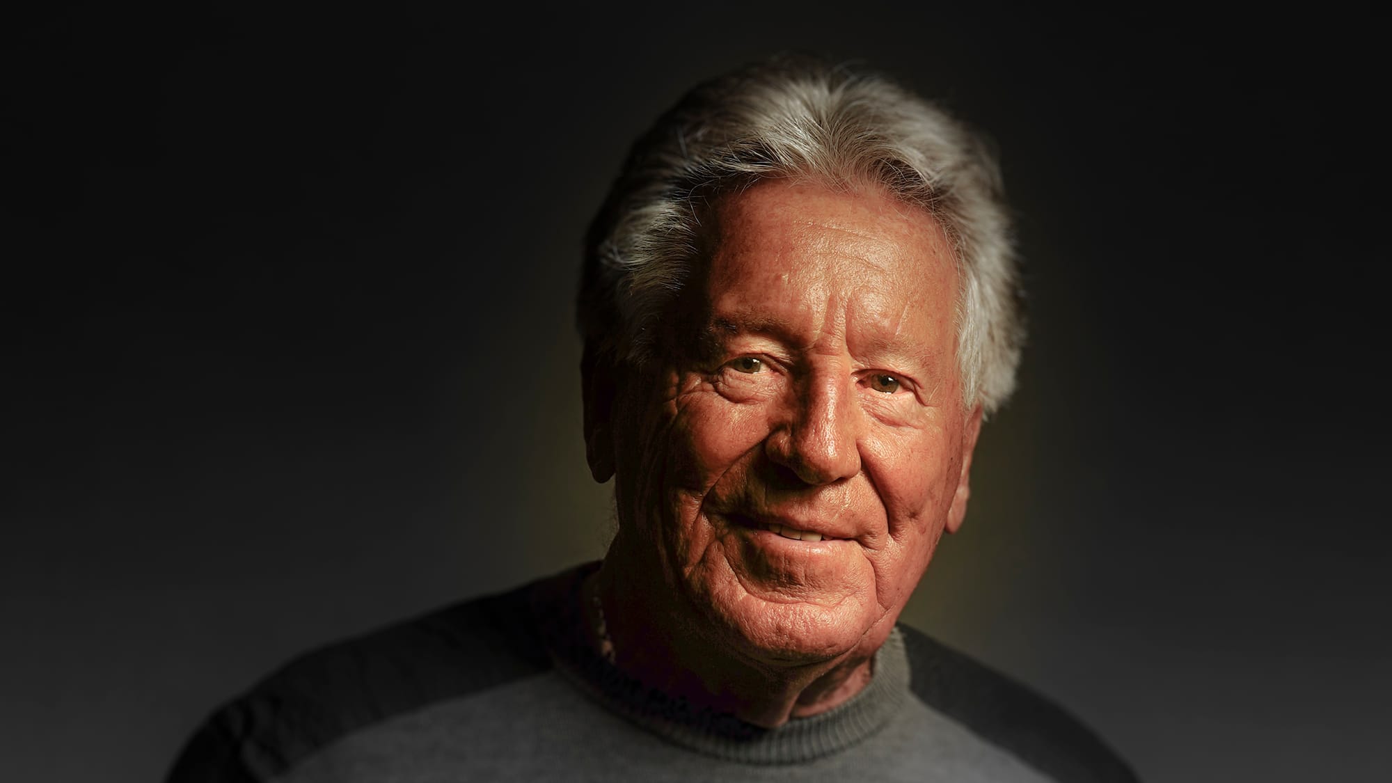 Race driver Mario Andretti poses for a portrait at his home in Nazareth, Pa. on Wednesday, March 20, 2024. Photography by Don