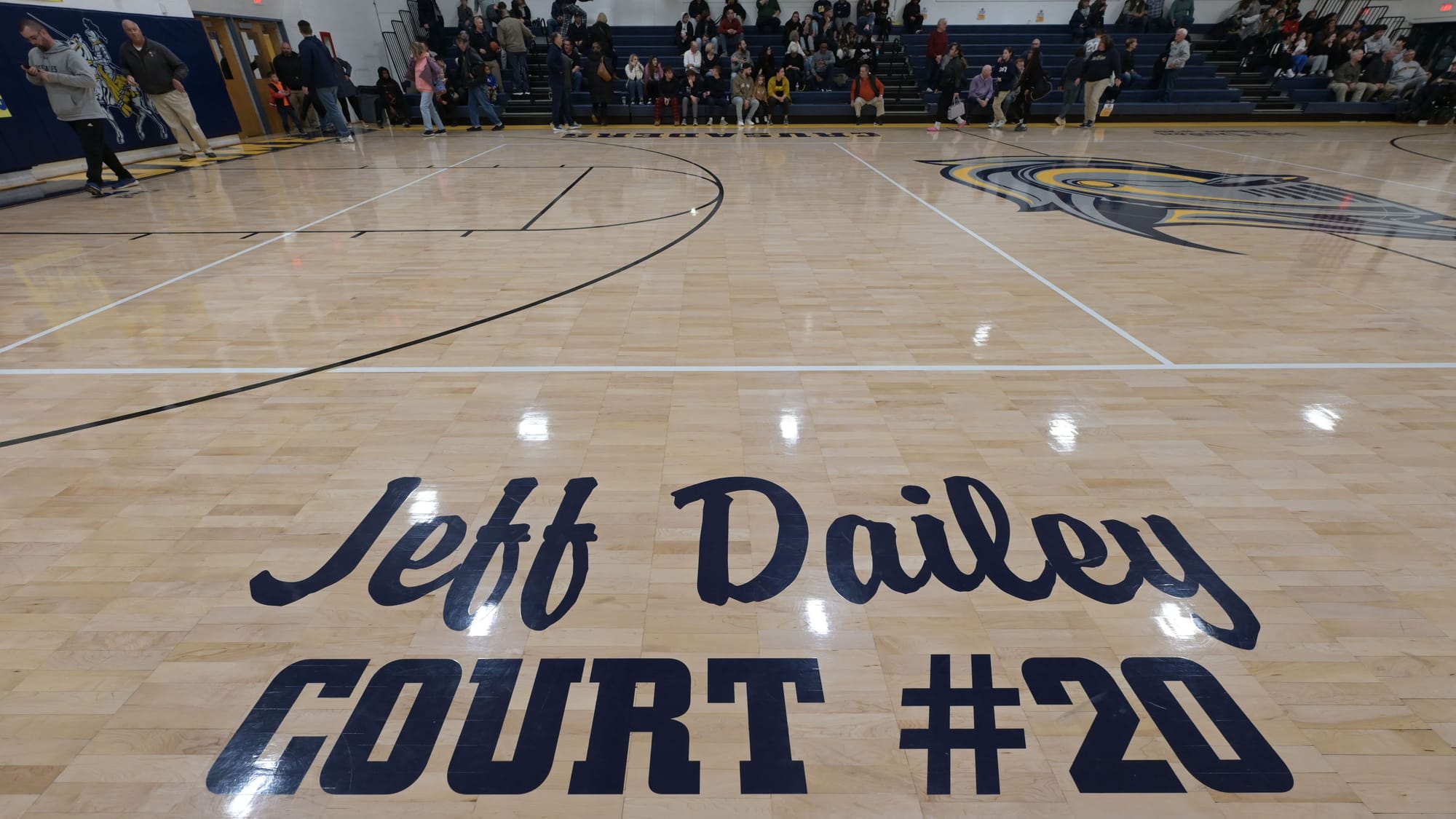 Players warm up before a court dedication for Jeff Dailey on Friday, December 1, 2023, at Notre Dame-Green Pond High School.