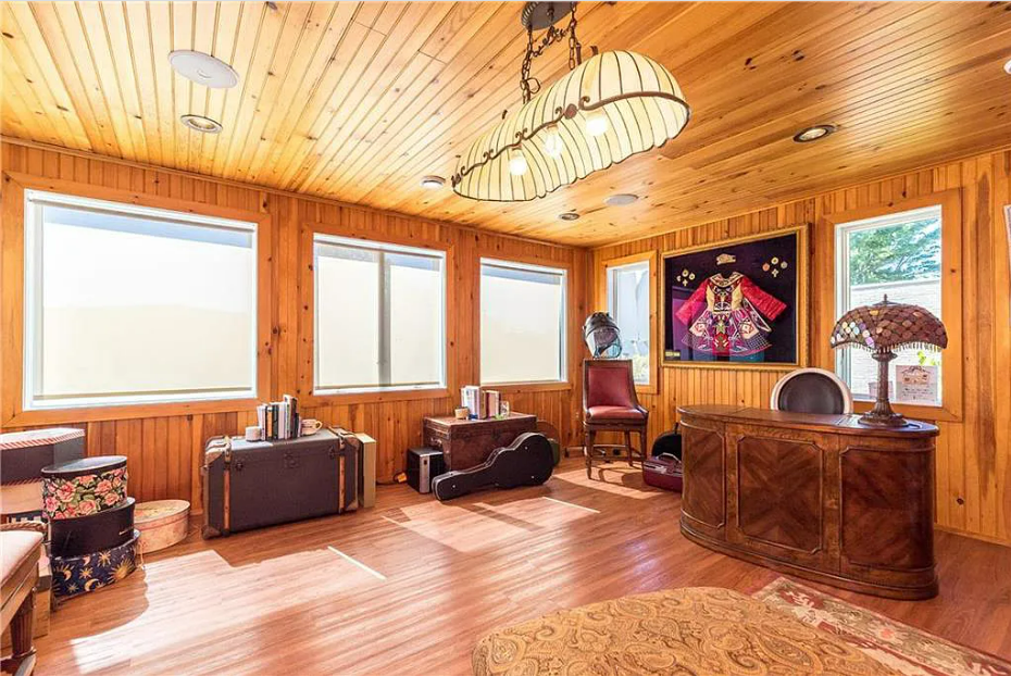 Many houses have wood floors, but not many can also boast of wood walls and a wood ceiling