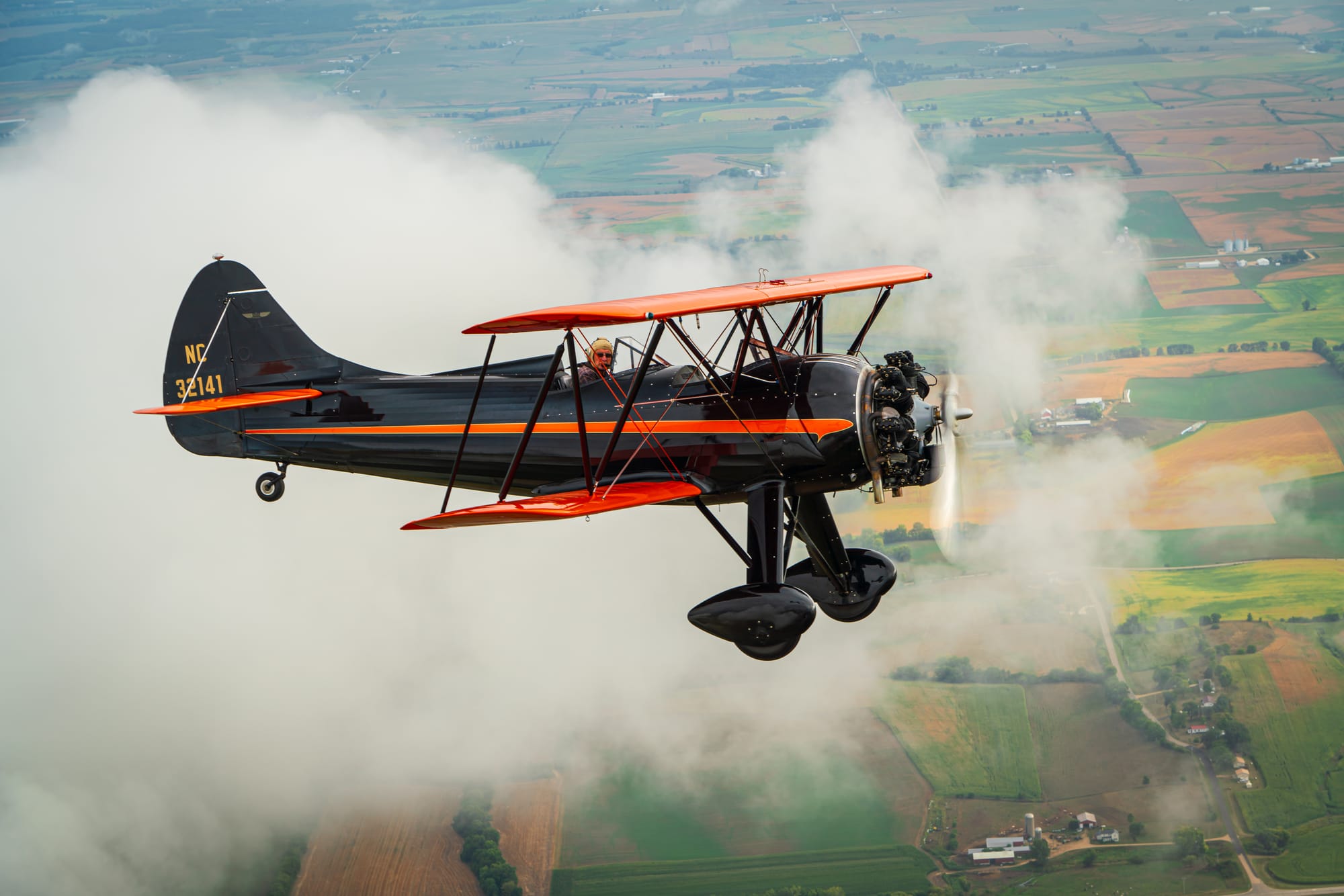 Dan Wilkins flying his WACO UPF-7 Biplane.