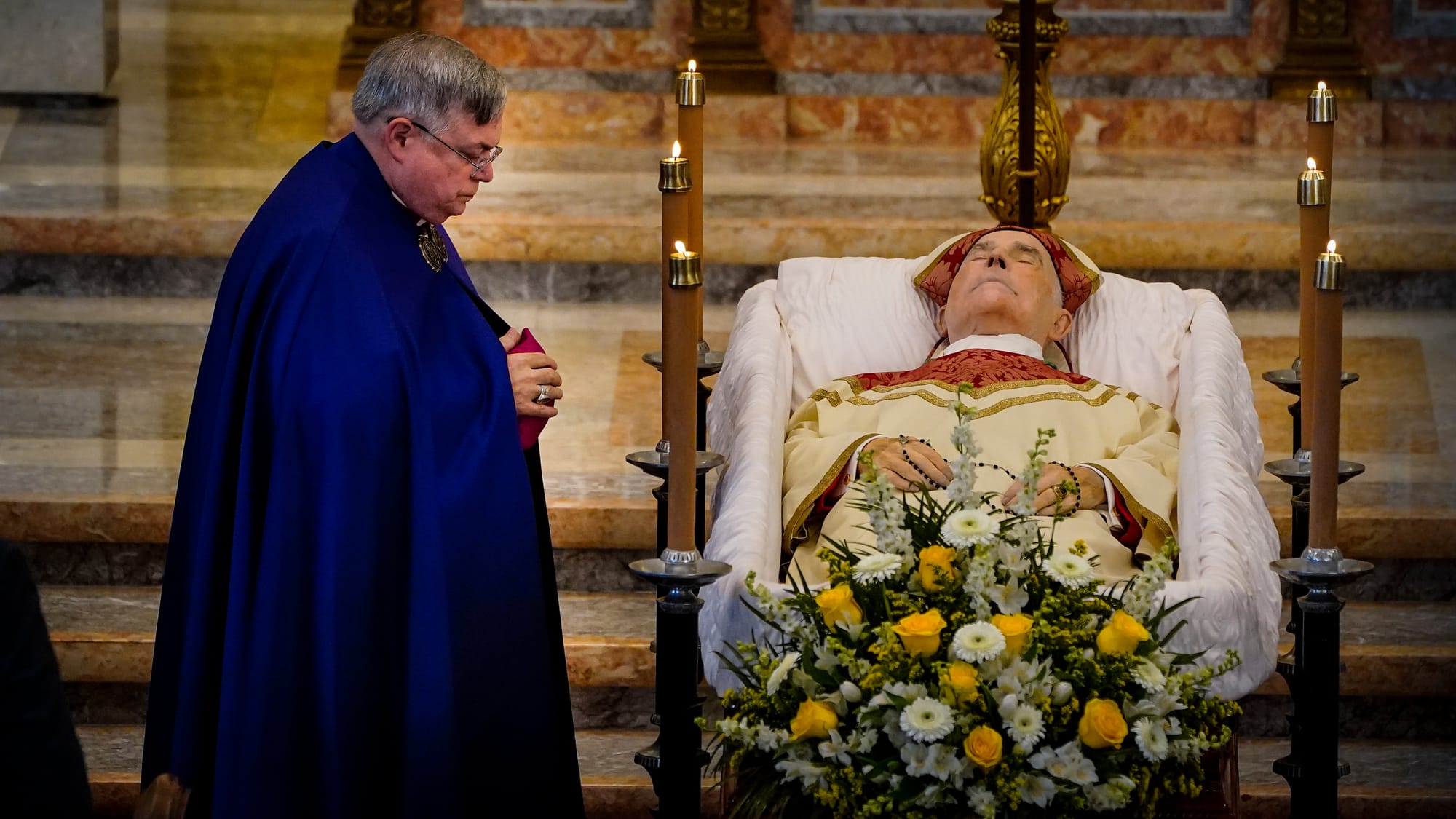 Bishop Alfred Schlert of the Diocese of Allentown, left, prays at the side of Bishop Cullen. Ceremonies of Reception of the B
