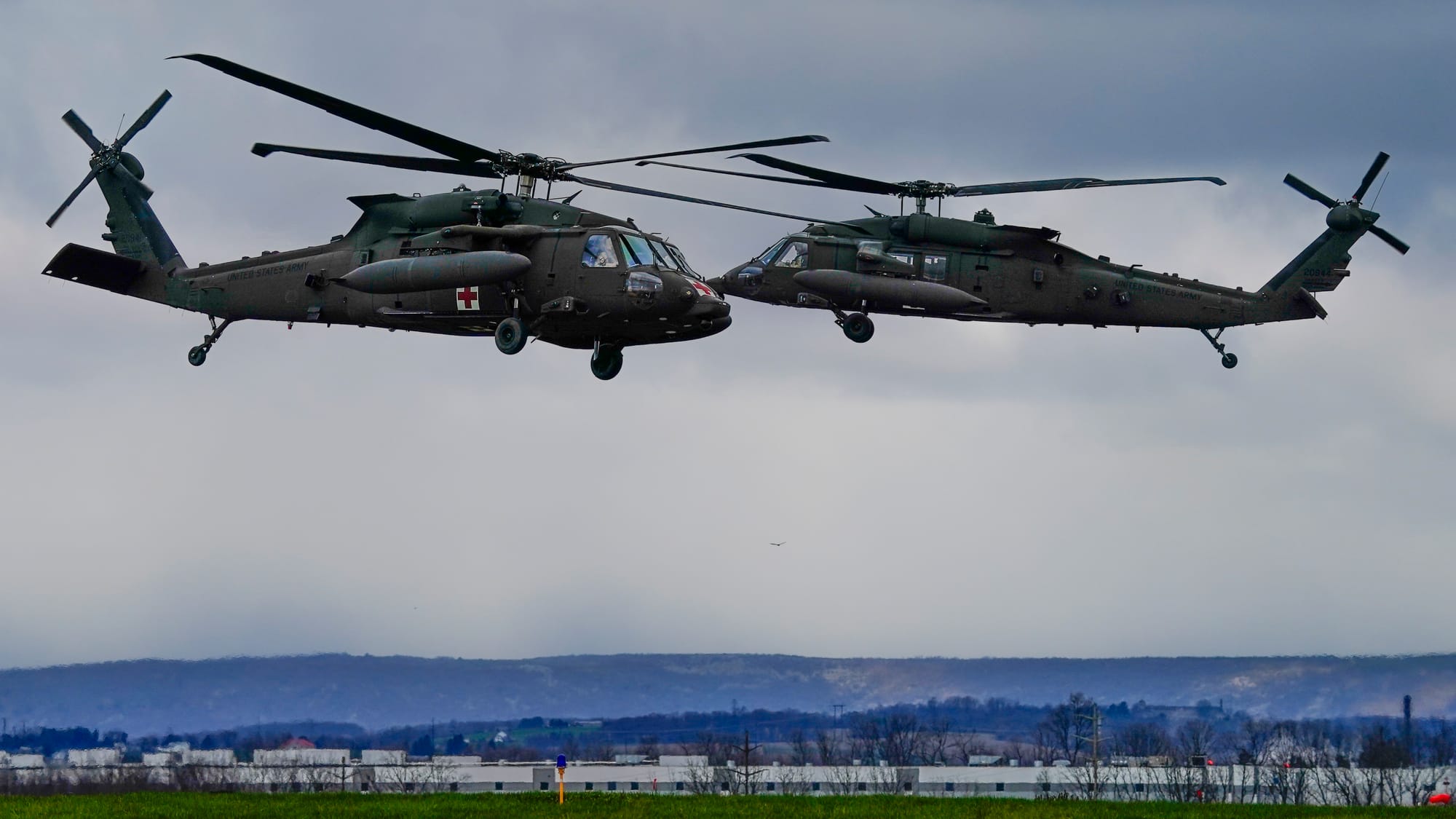 UH-60 Blackhawk helicopters from from Fort Drum in Jefferson County, New York, land at Lehigh Valley International Airport on