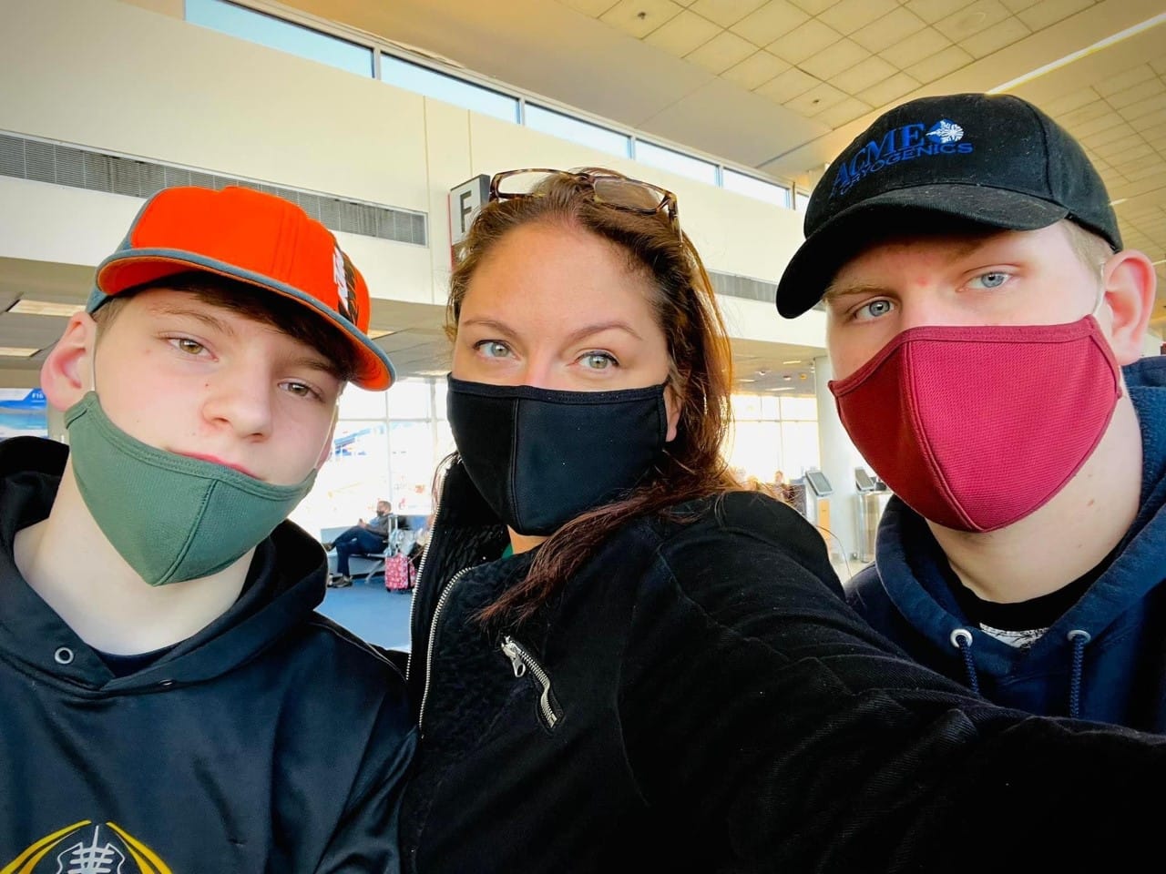 Patty Scheirer and her two sons, who are now taller than she is. She made lifestyle changes to combat heart disease.