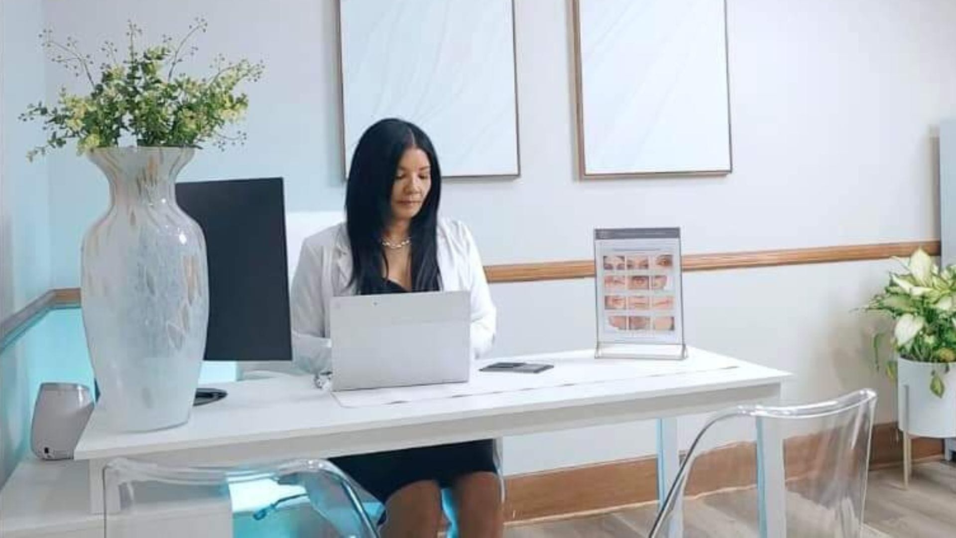 Owner Vanessa Esbri sits at her desk in Mariposa Medical Aesthetics & Wellness Spa.
