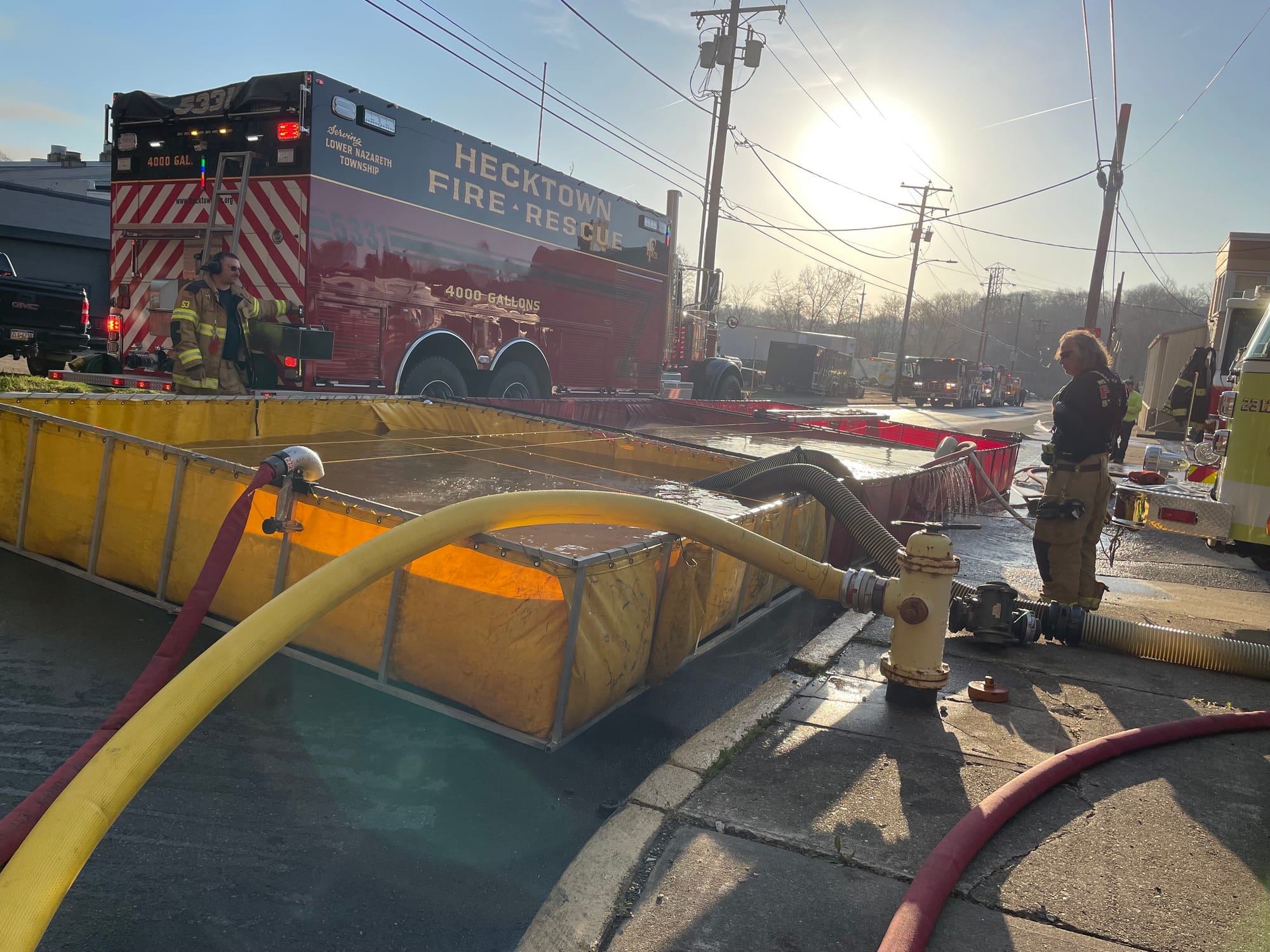 Firefighters at the scene of a massive fire in West Easton on Tuesday morning.