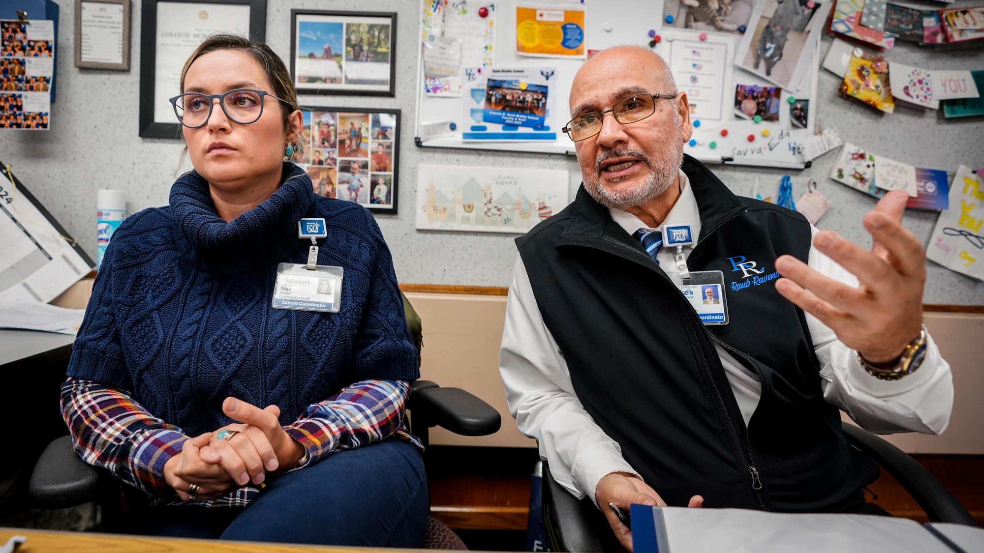 St. Luke's coordinators Olga Jaeger, left, and Ismael Vasquez talk about their programs at Raub Middle School in Allentown, P