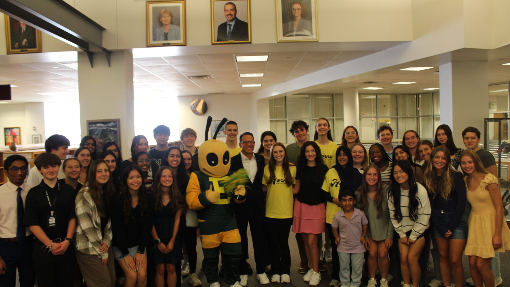 Governor Josh Shapiro takes photos with Emmaus High School students at the event.