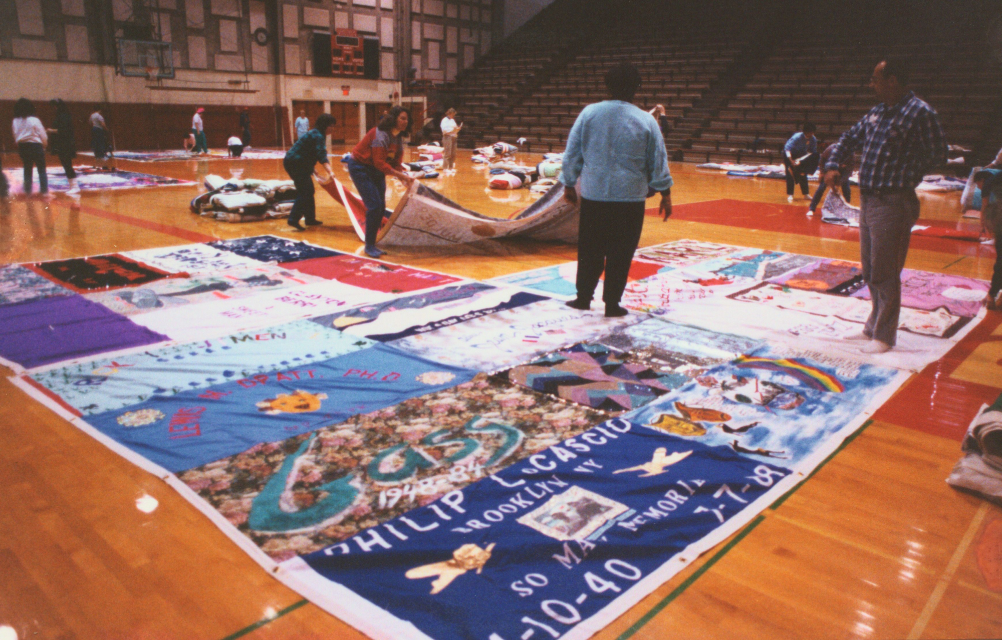 Lehigh Valley residents assemble the AIDS quilt being before its presentation in 1991. The AIDS quilt is a memorial to celebr