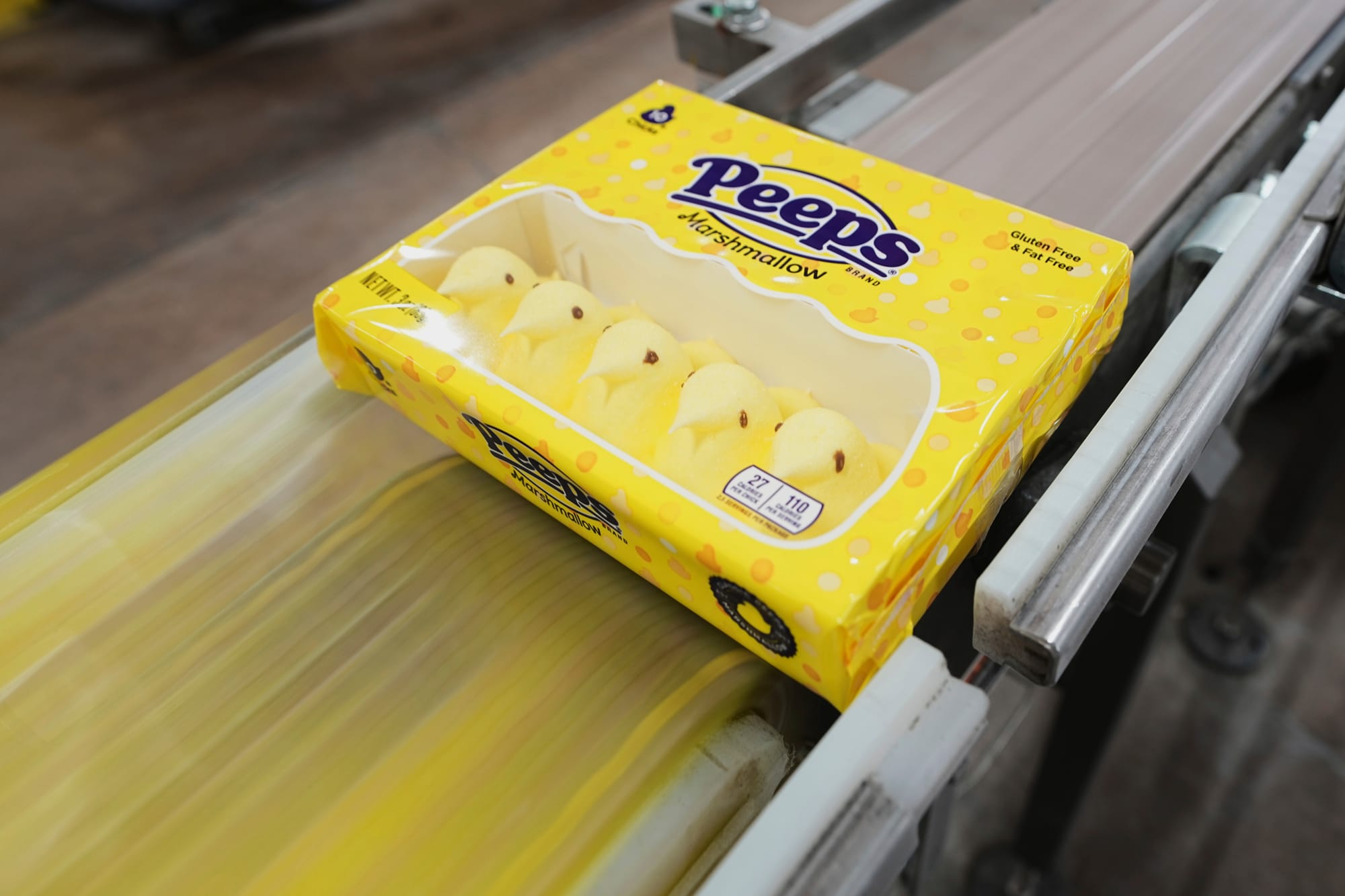 A box of Peeps marshmallow treats moves through the manufacturing process at the Just Born factory in Bethlehem, Pa., Thursda