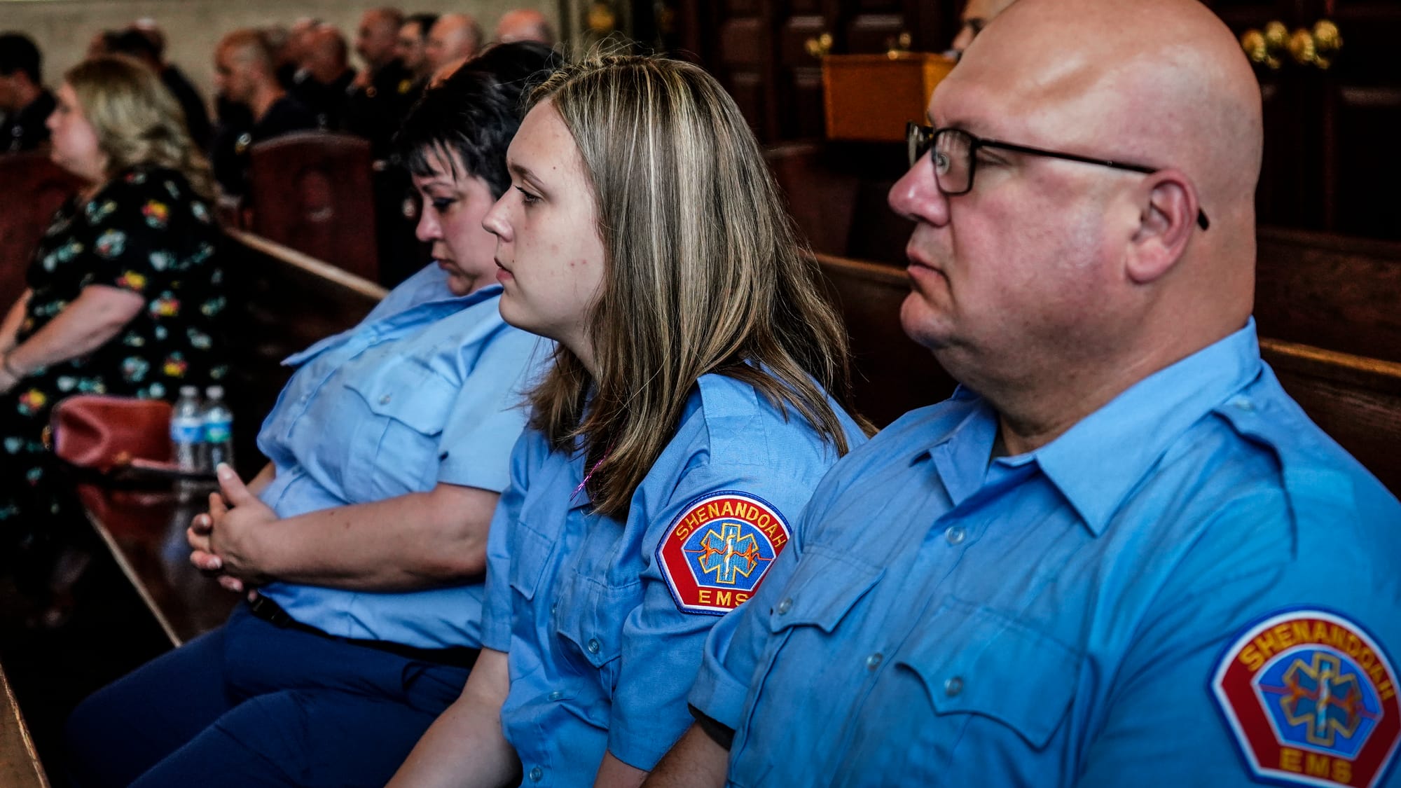 EMTs from Shenandoah, Pa., Chris Kiskeravage's home town, attend Wednesday. A Mass of Christian Burial was held at the Cathed