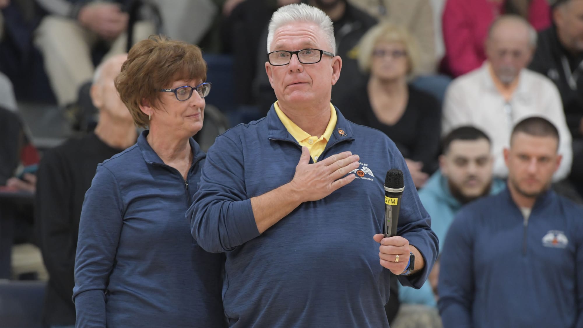 Jane Dailey and her husband Bobby, thanks the crowd during a court dedication for Jeff Dailey on Friday, December 1, 2023, at