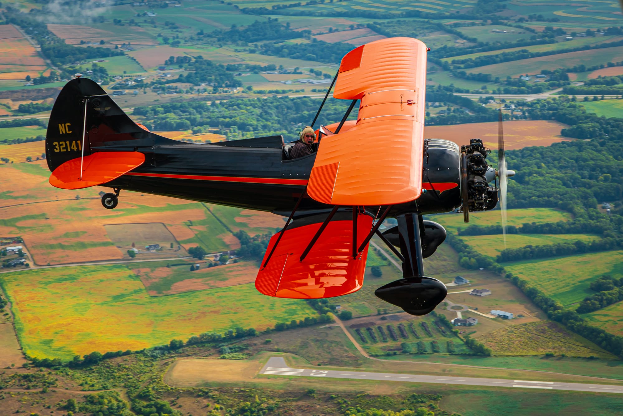 Dan Wilkins flying his WACO UPF-7 Biplane.